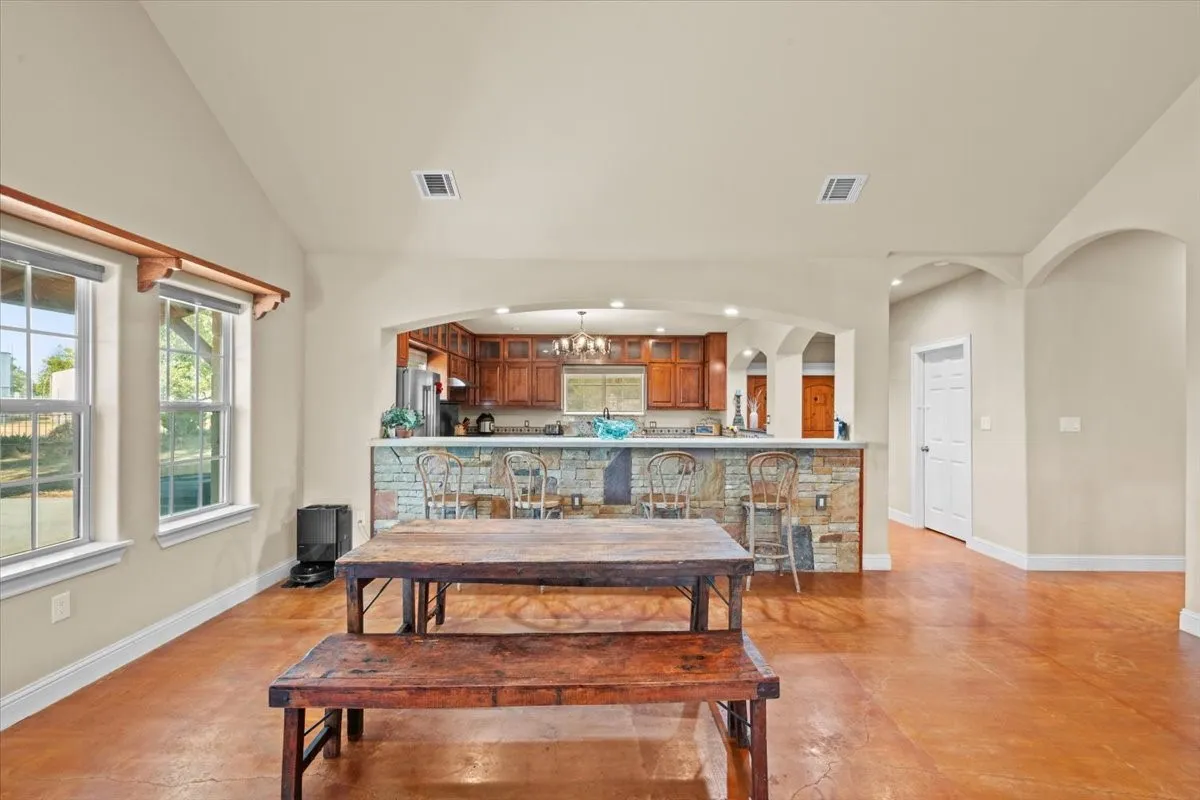Dining area at 3601 Oak Cir, Weatherford, TX 76088 - 3664 sq ft on 2.92 acres with a 2600 sq ft workshop