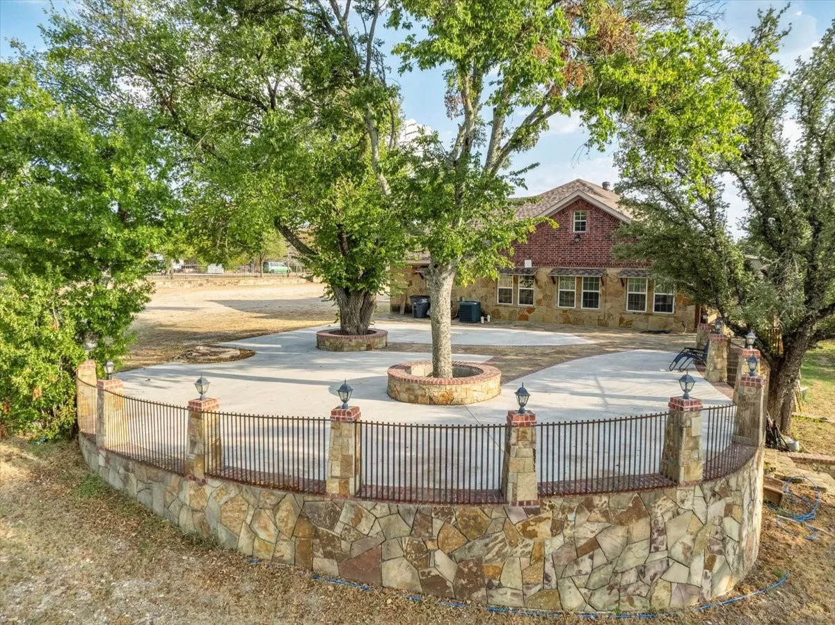 Northern view of 3601 Oak Cir, Weatherford, TX -76088; 3664 sq ft on 2.92 acres with a 2600 sq ft workshop