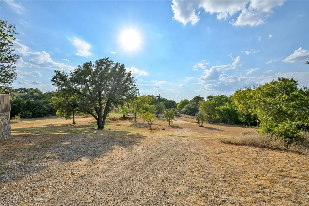 3601 Oak Cir, Weatherford, TX 76088 - 3664 sq ft on 2.92 acres with a 2600 sq ft workshop
