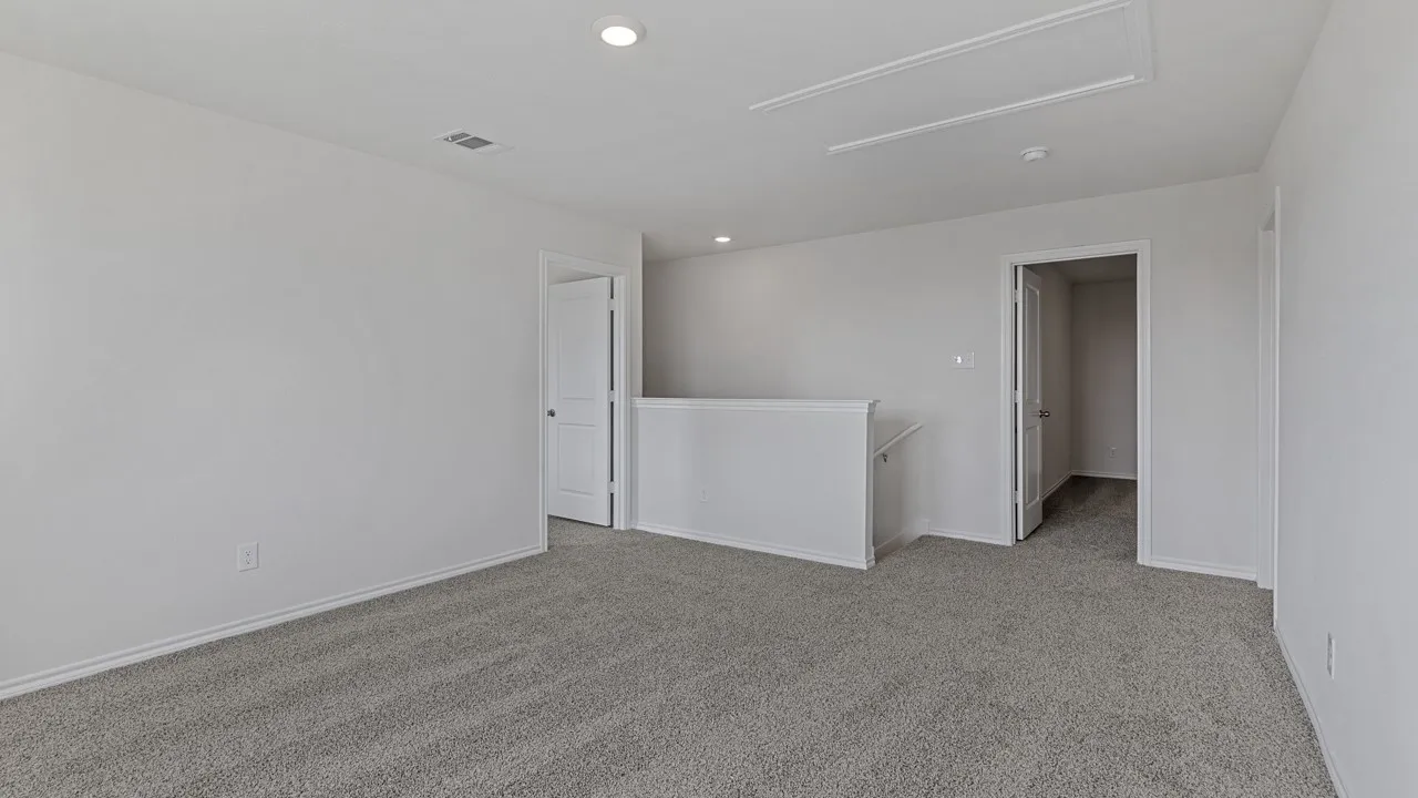 Recessed lighting, carpeted flooring, and white walls