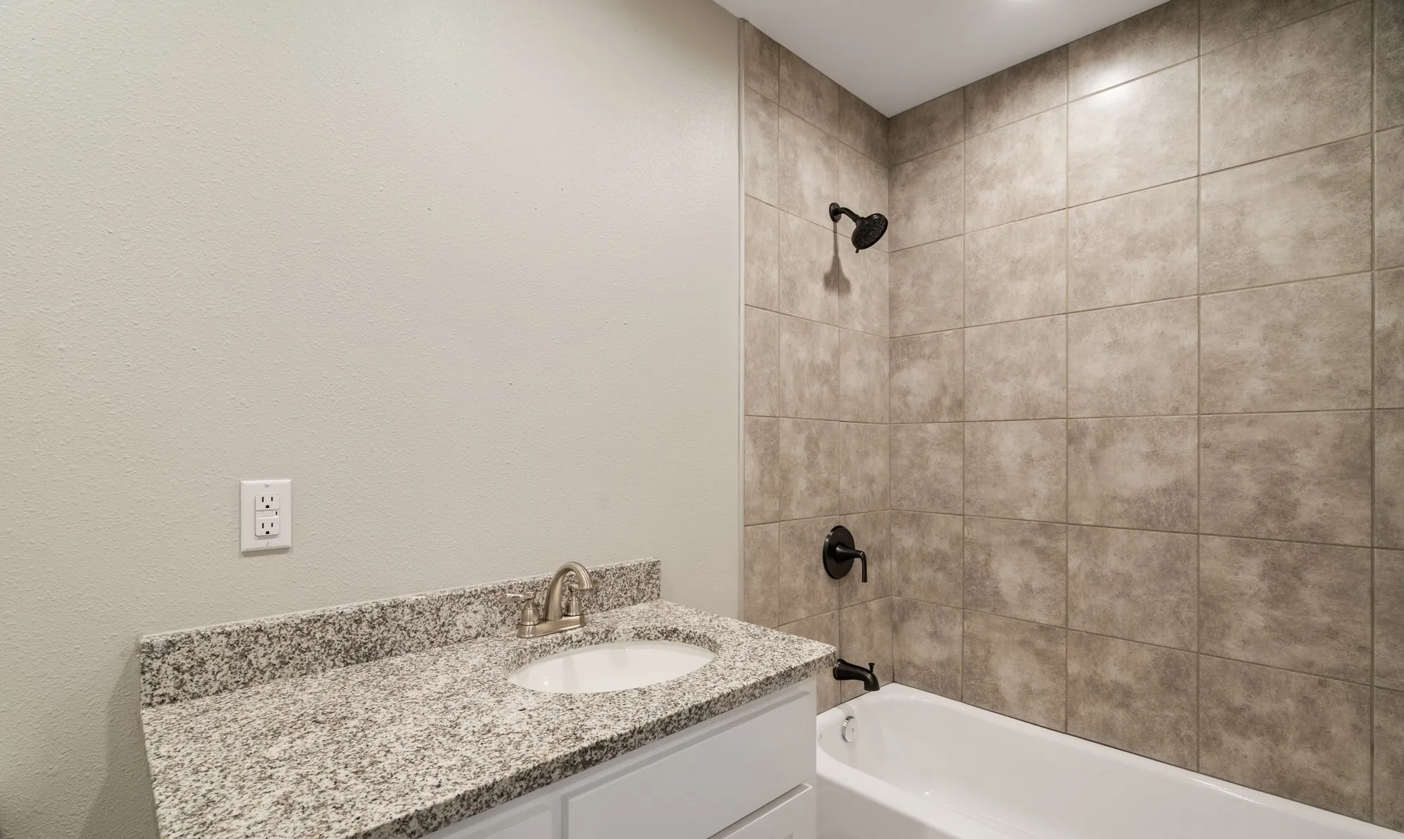 Granite countertop vanity with an undermount sink