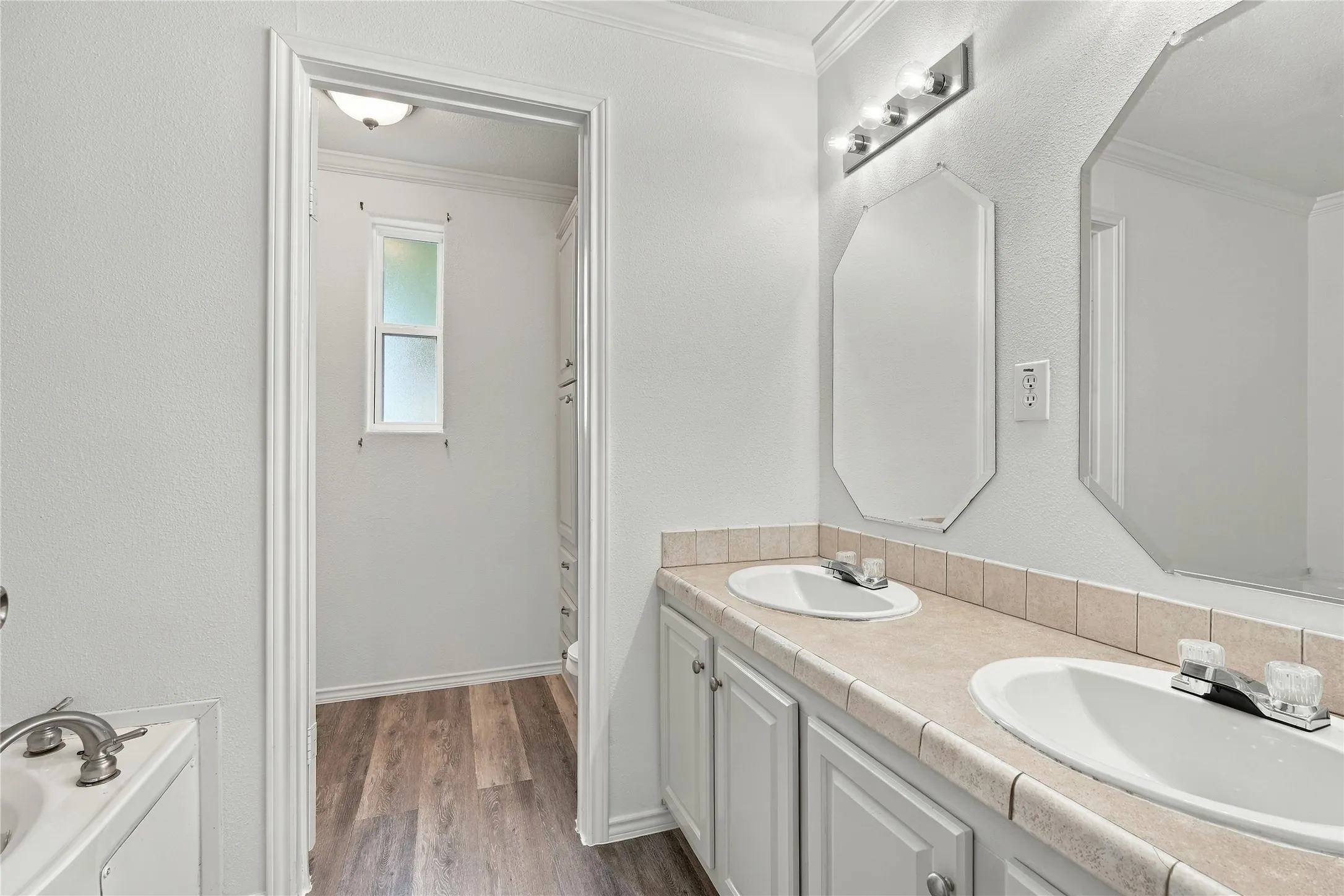 Dual vanity with integrated sinks, and matching mirrors