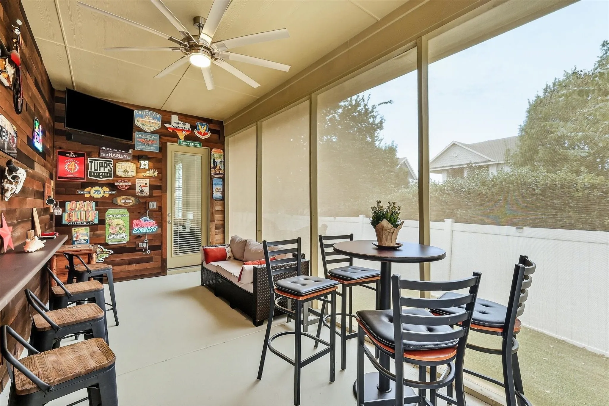 Make room for memorable evenings in this spacious screened retreat, with areas for dining and relaxing.