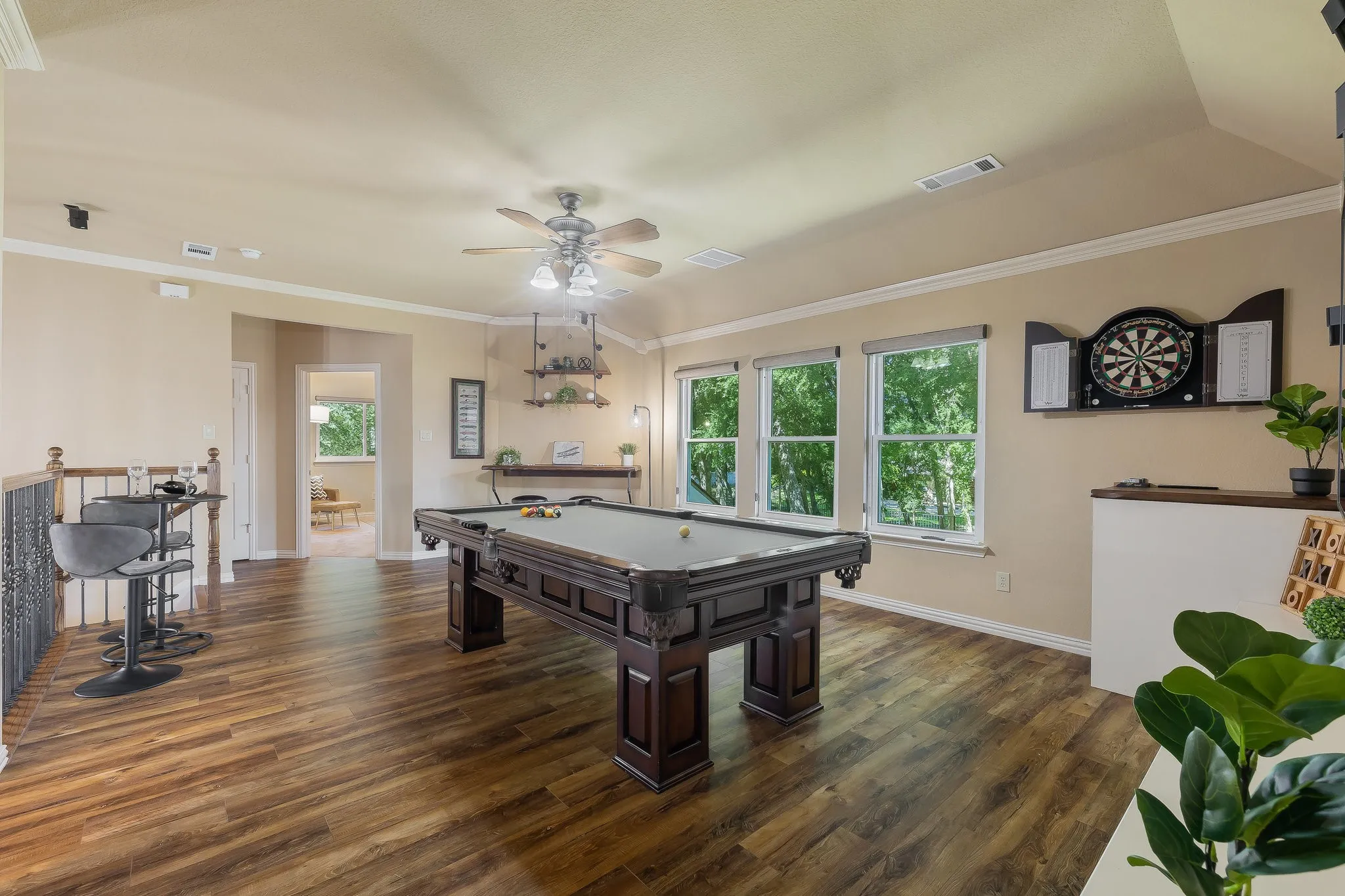 Pool table, sound system, and TV included in the sale of the home