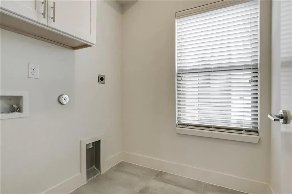 Upper cabinetry with brushed nickel hardware
