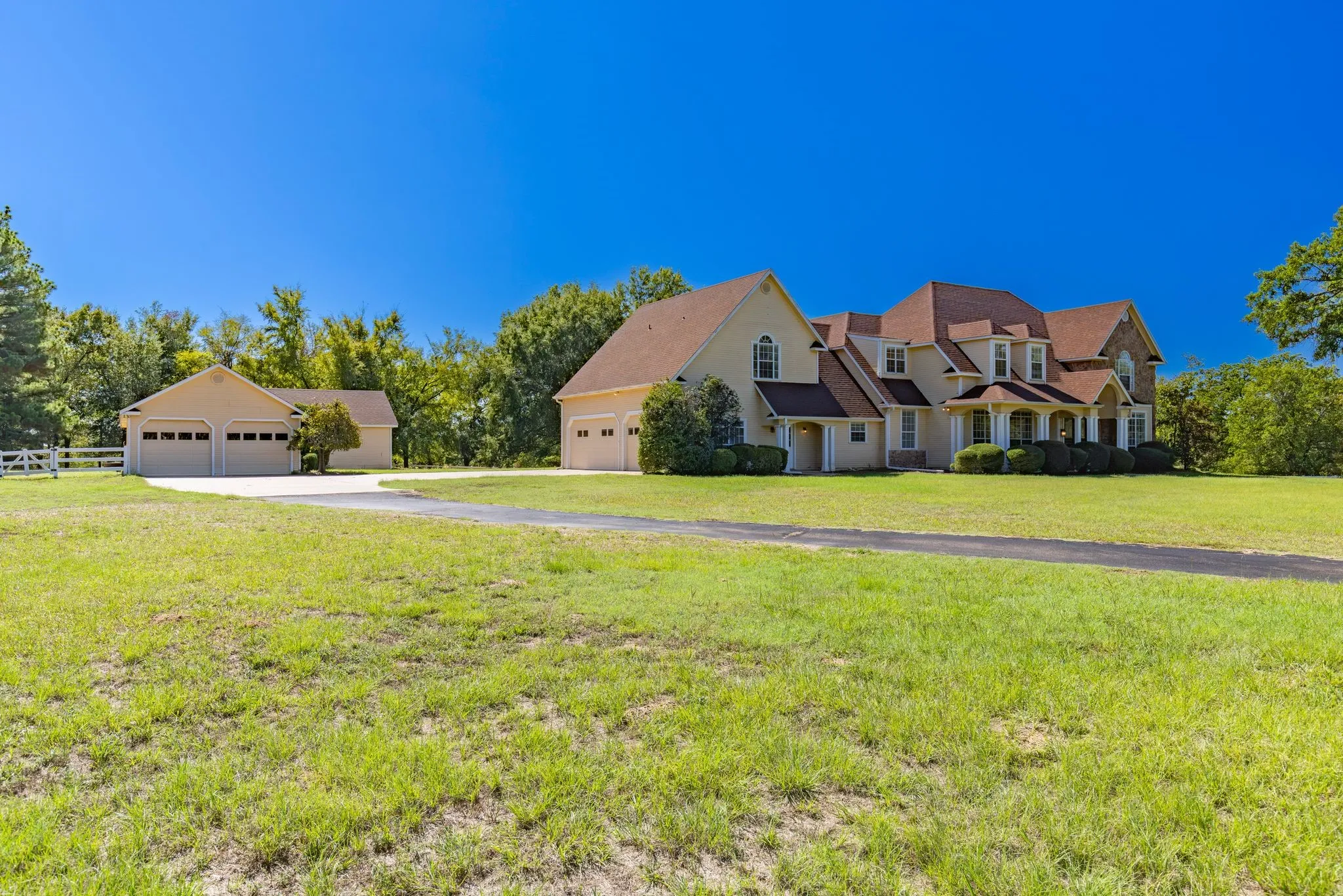View of driveway, house and workshop from front pasture- all on a hilltop!