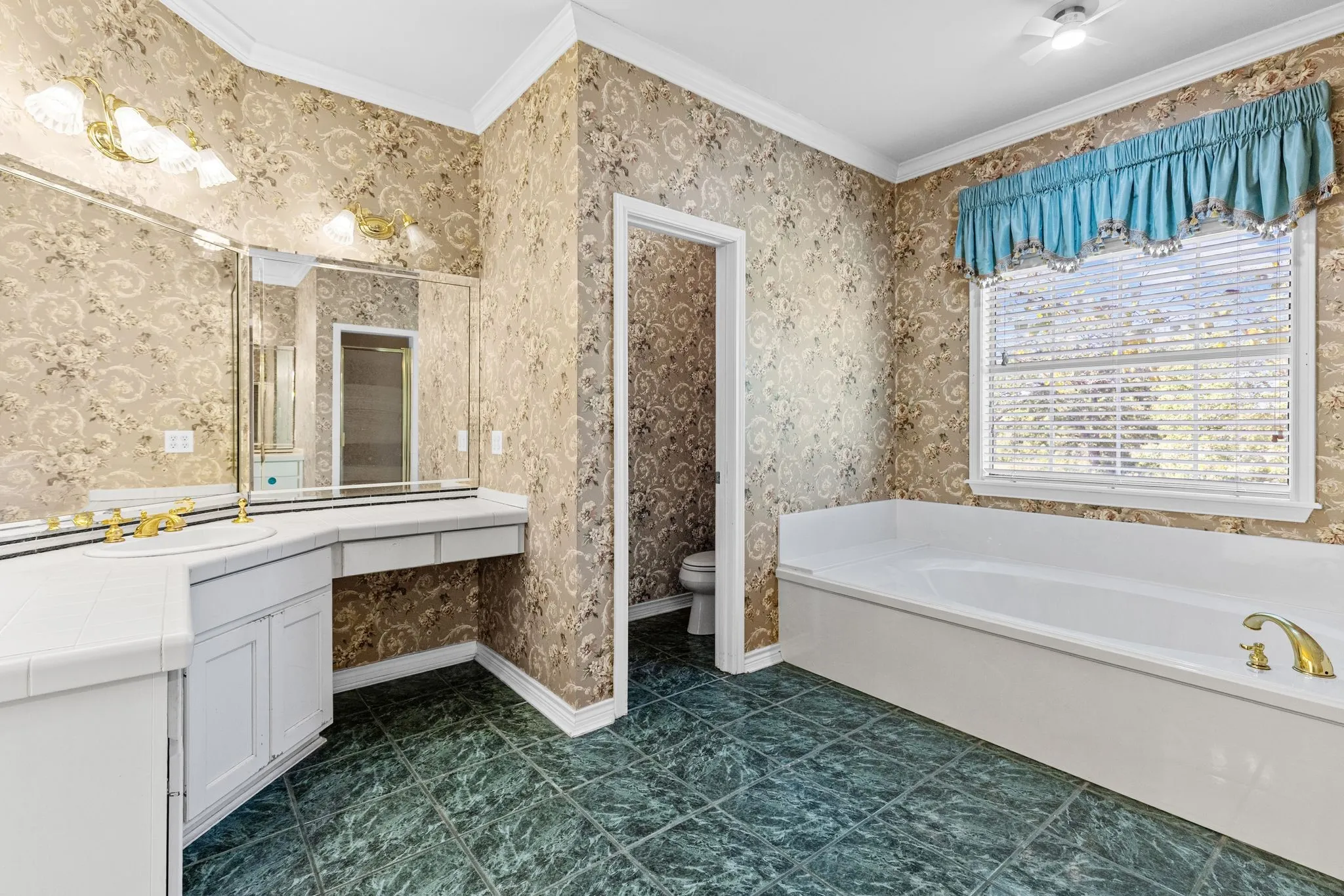 Ladies' vanity with dressing table area.
