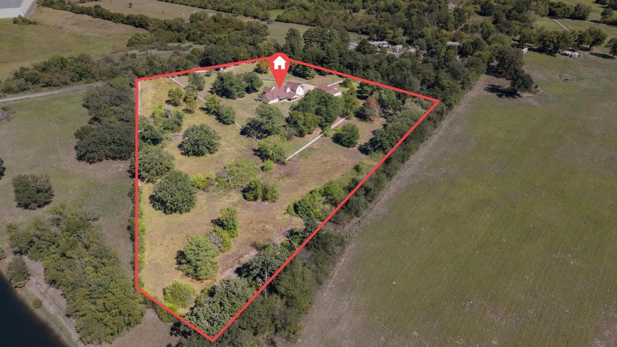 10 acres on edge of town, with multiple fences. Boundaries are approximate.