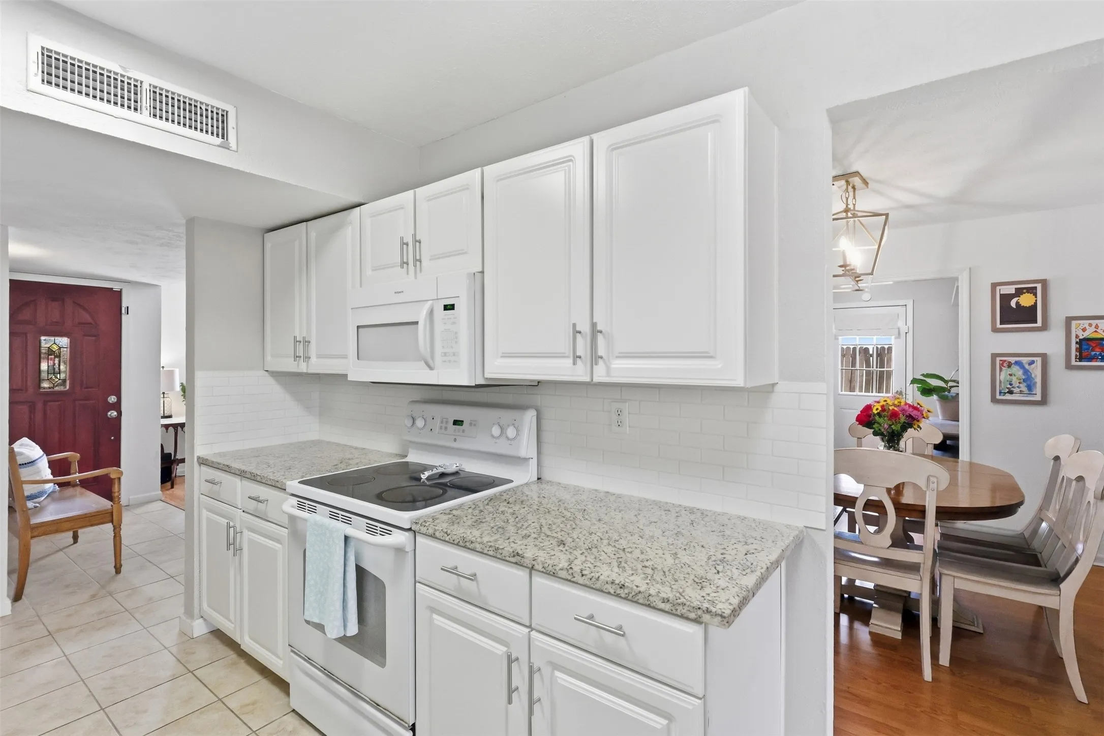 Functional kitchen layout with generous cabinetry and an easy connection to the dining and living areas.