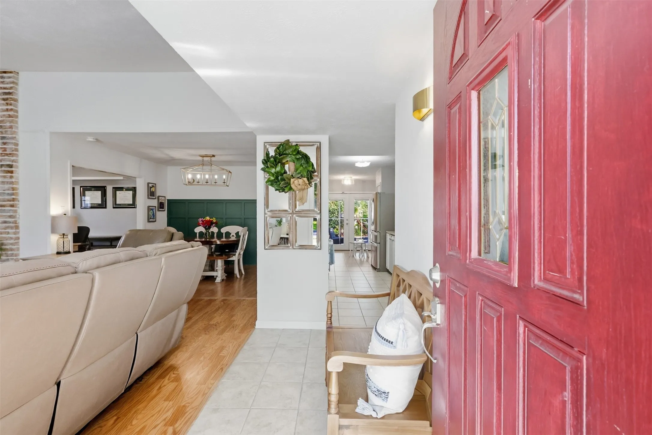 Bright entryway offering a first look into the open living and dining spaces.