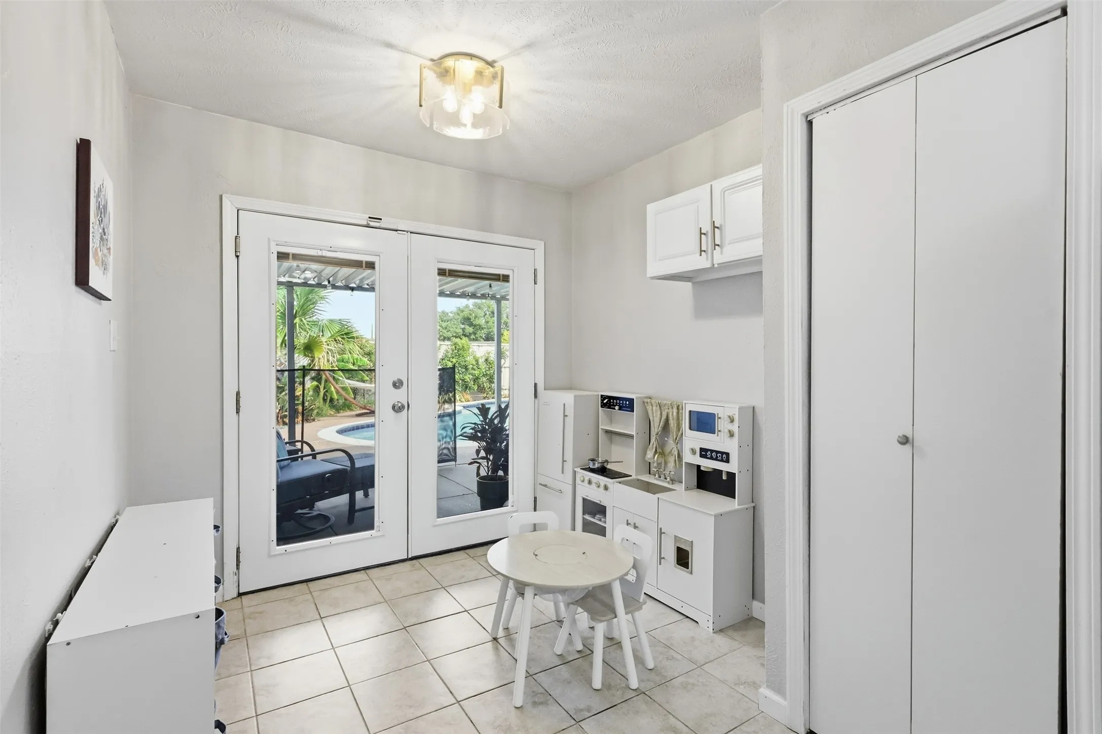 Bright interior hallway with neutral finishes and easy access throughout the home.