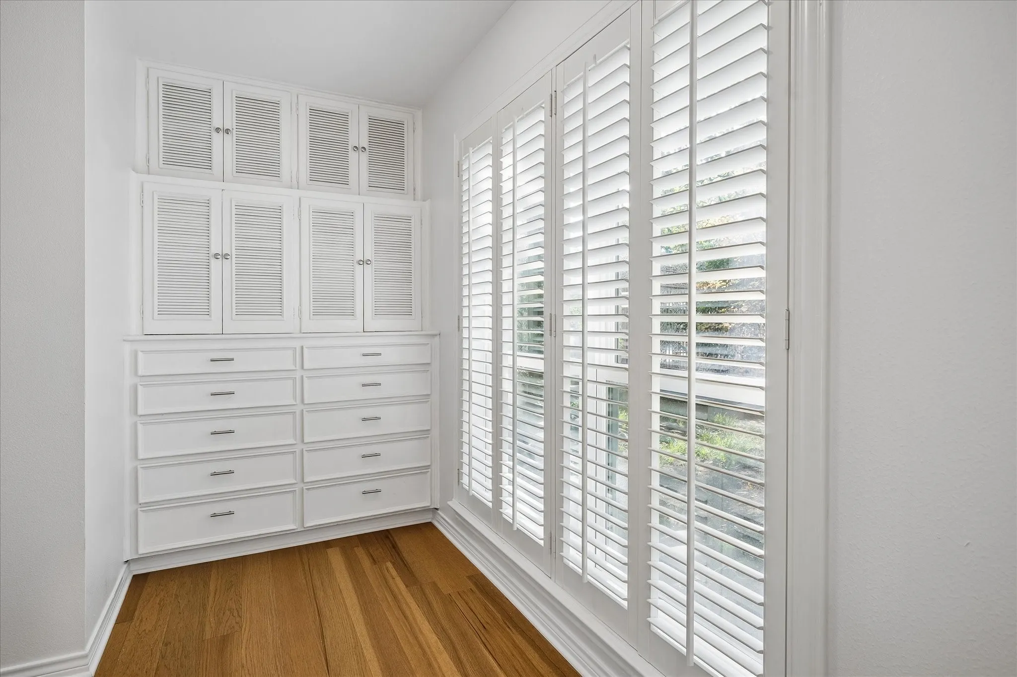 Attached Dressing Area With Lots Of Light And Lots Of Storage
