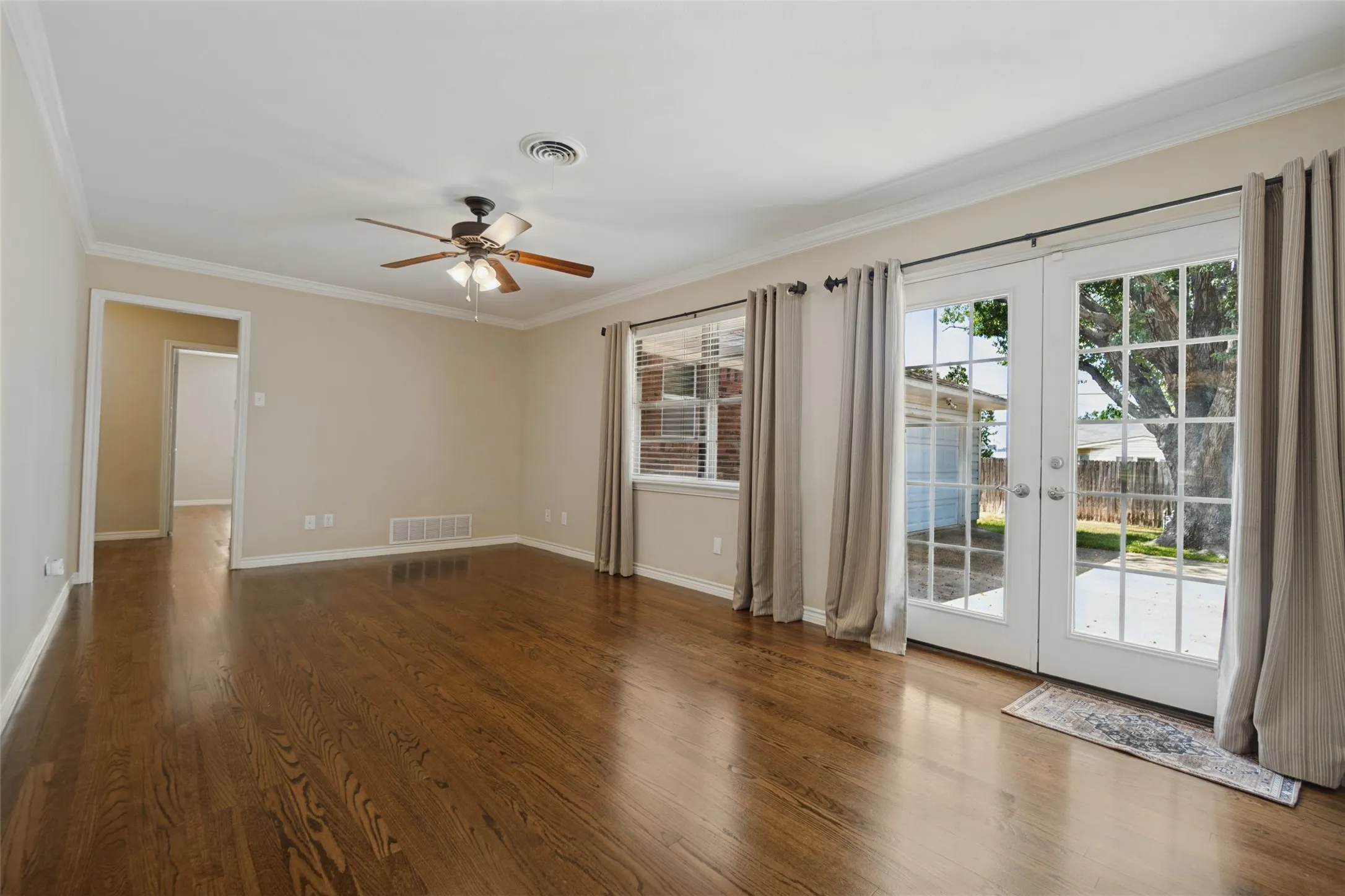 2nd living room features beautiful French doors leading to the patio and backyard.
