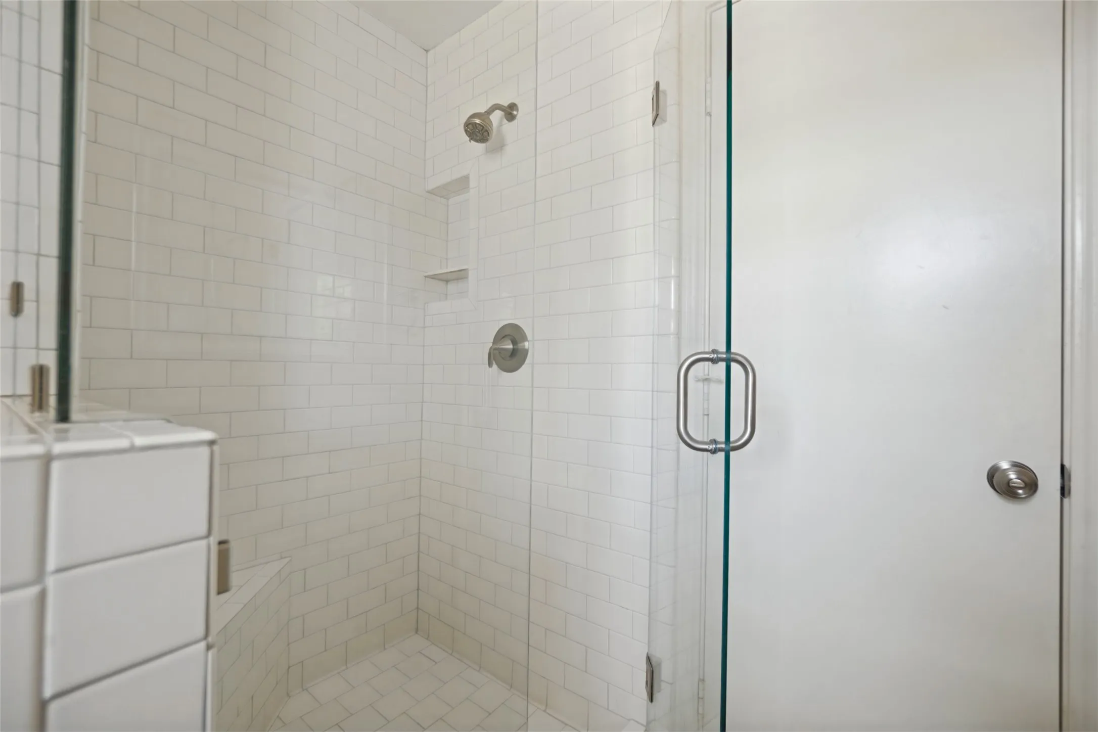 Updated shower with subway tile.