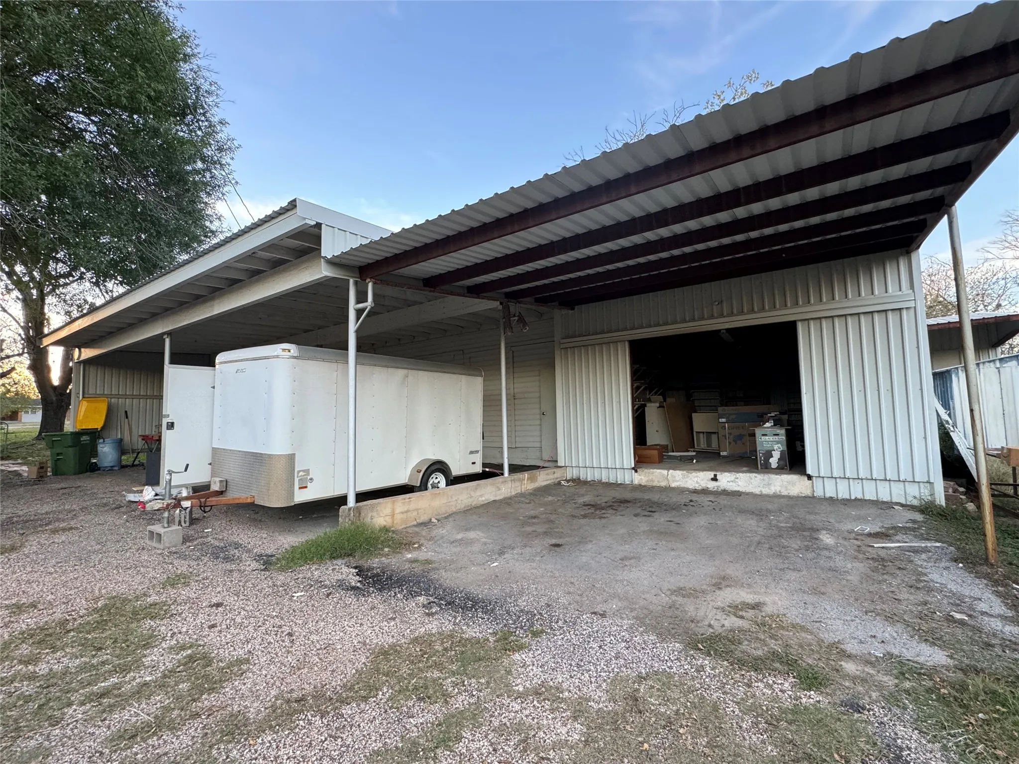 View of property exterior with an outbuilding