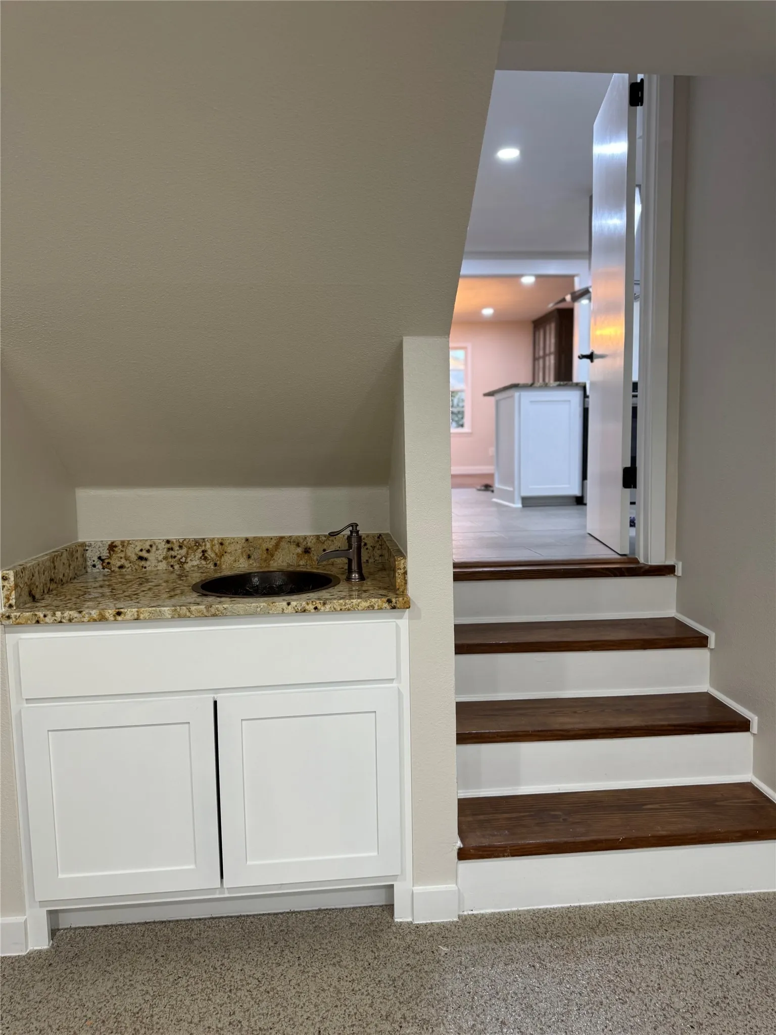 Stairway featuring sink