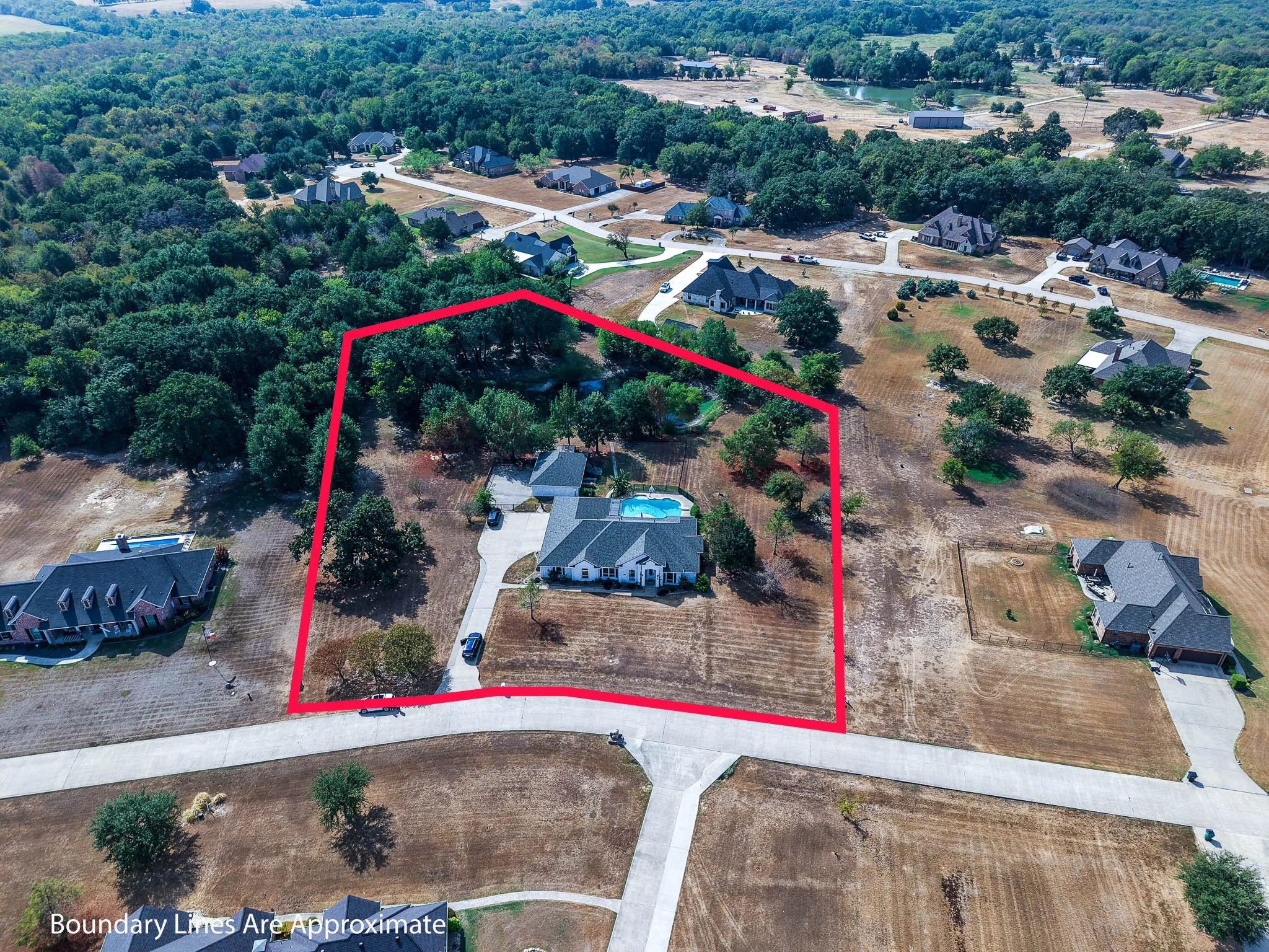 Aerial view of property showing approximate boundary lines.