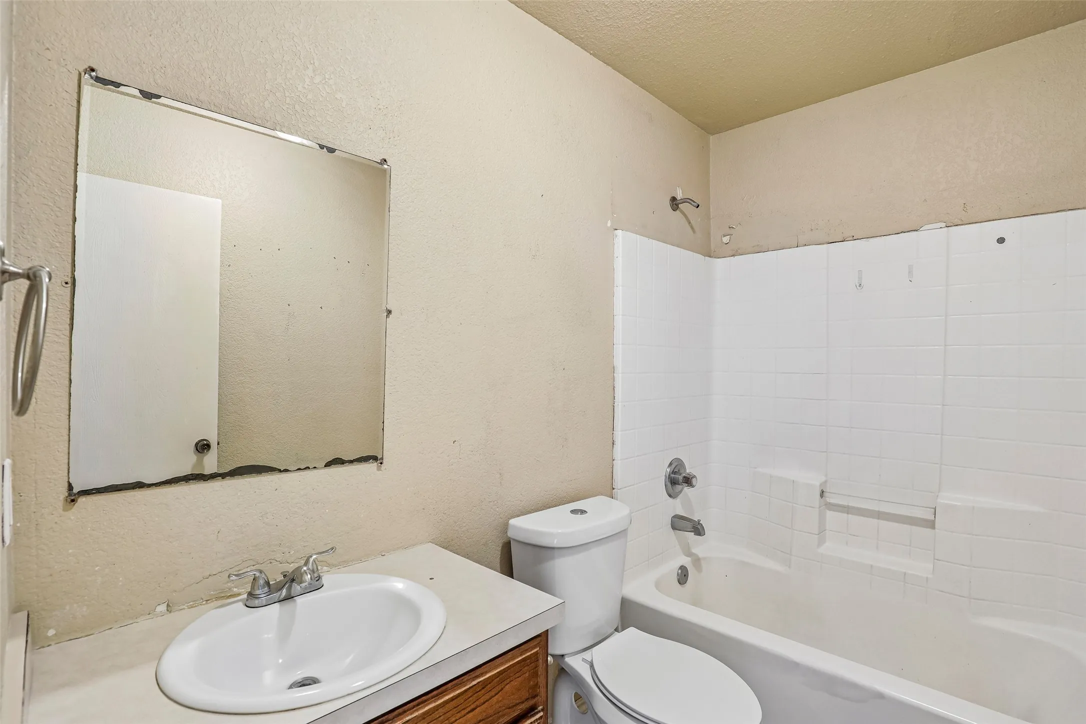 Full bathroom with tub and shower