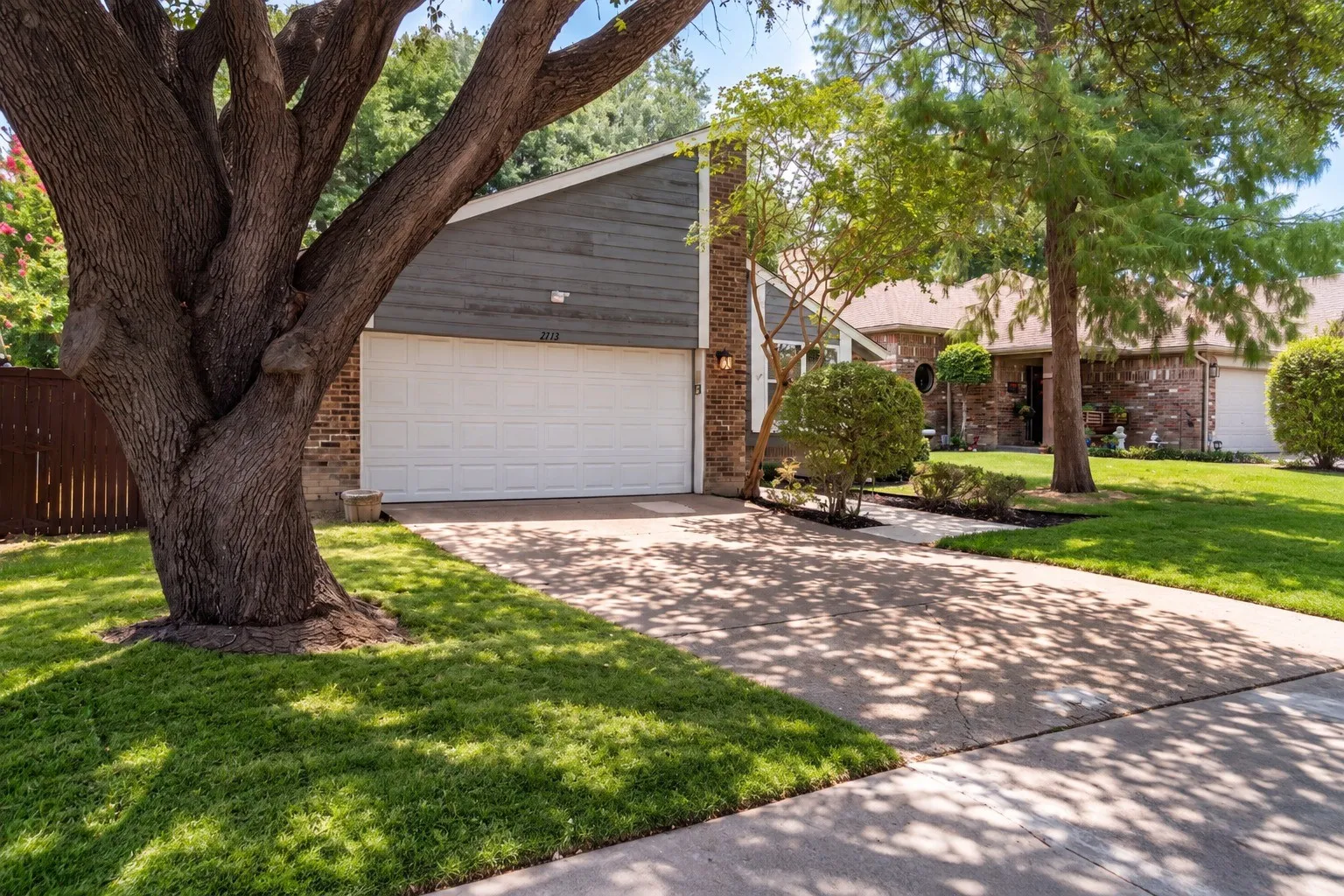 Front of the home with a two-car garage.