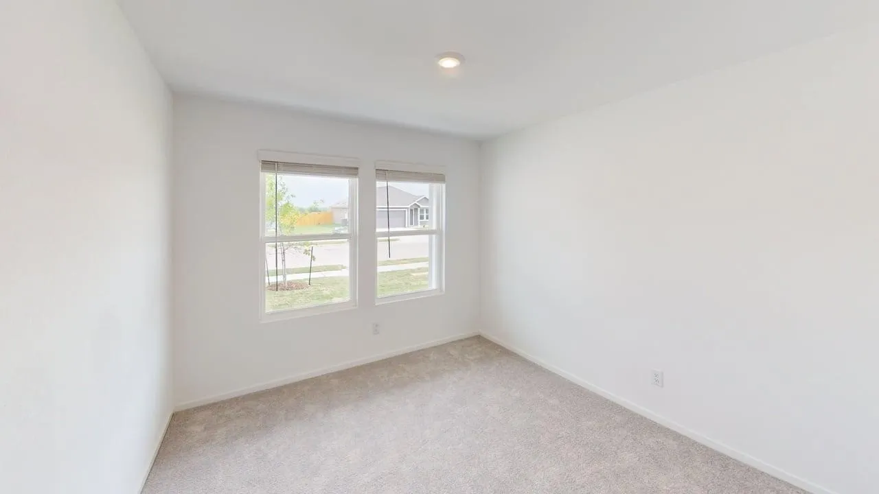 Neutral carpet flooring with light-toned walls