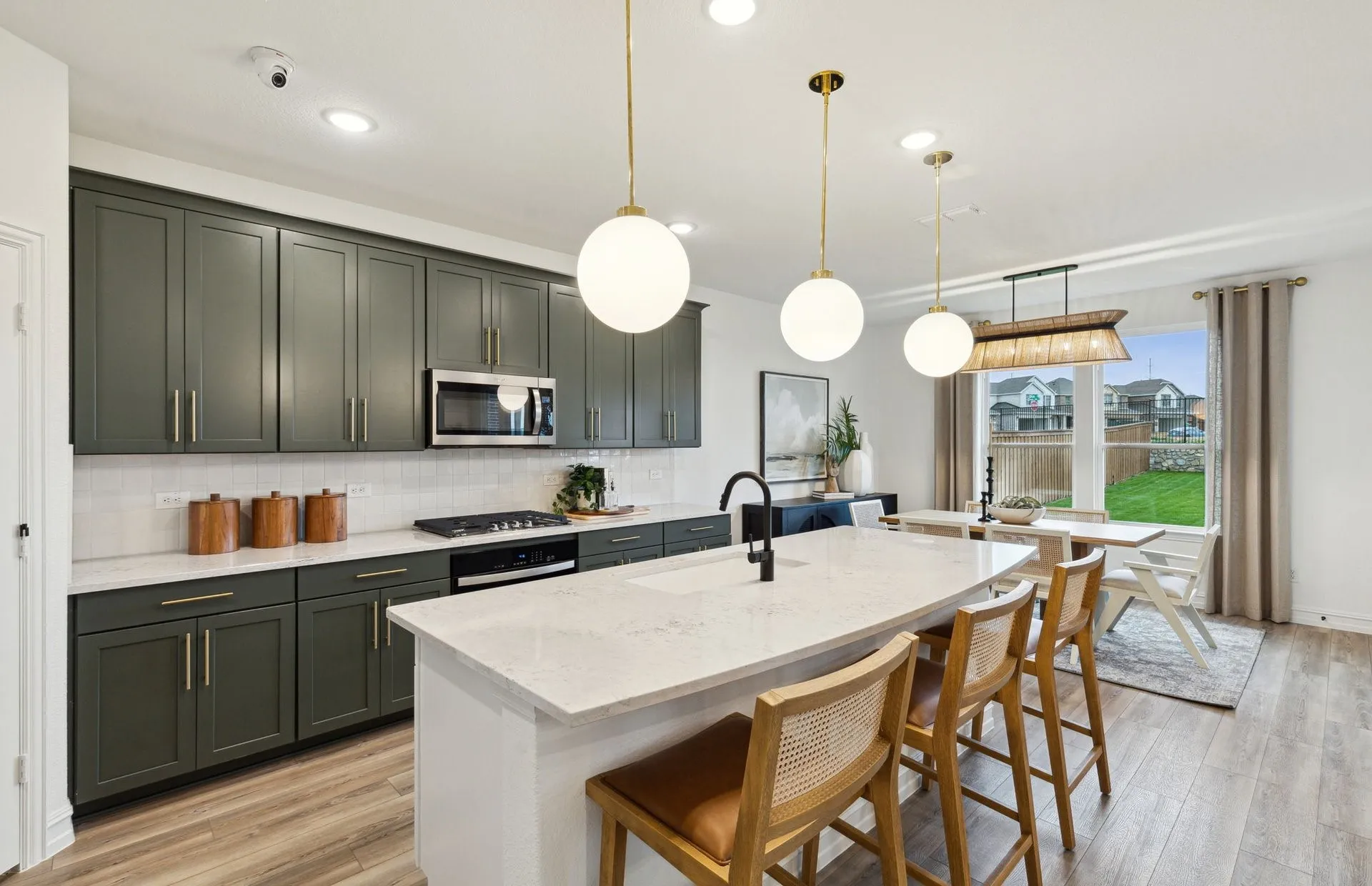 *Model Representation - Spacious kitchen with eat-in bartop island