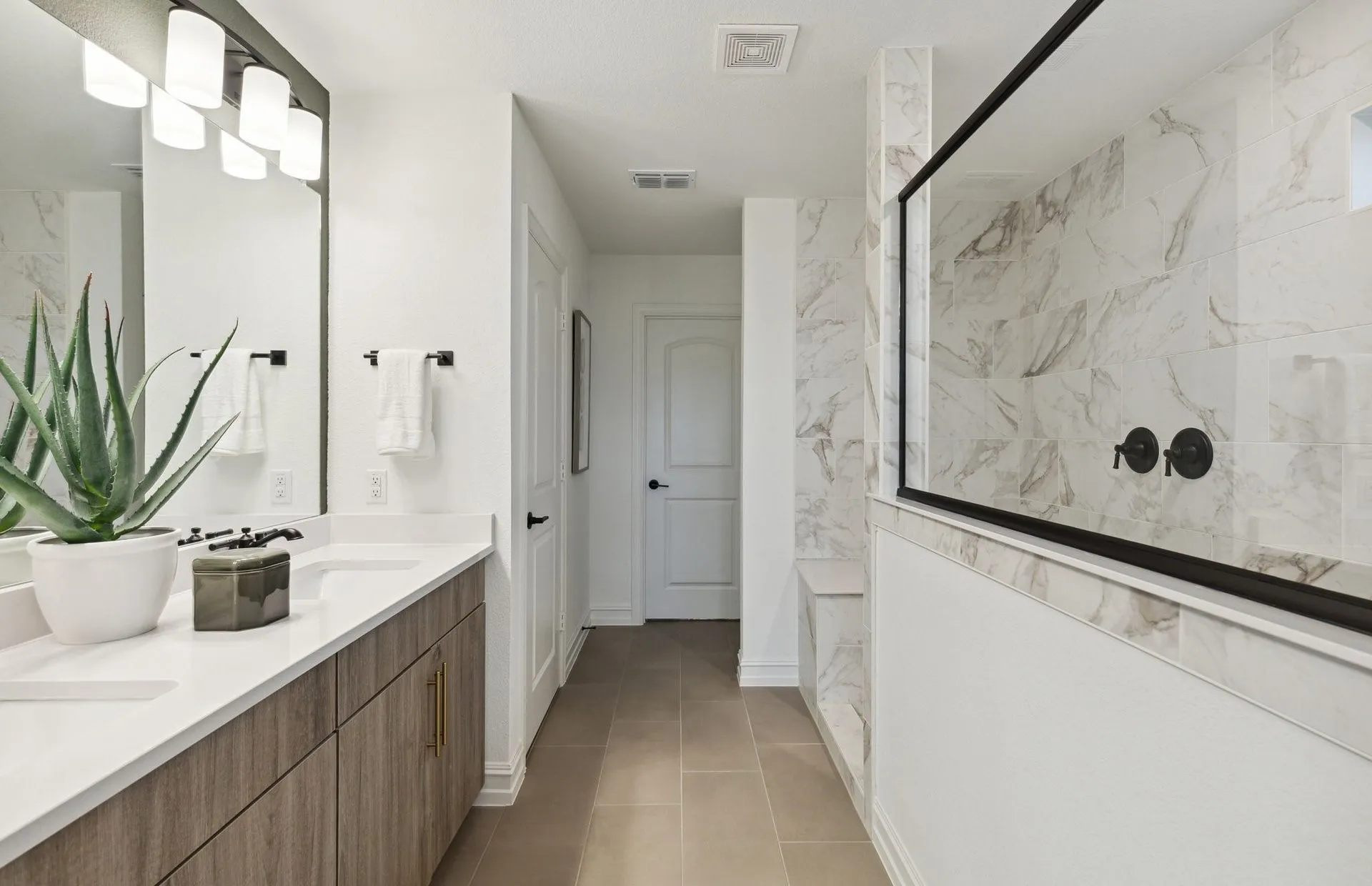 *Model Representation - Owner's private bath with double vanity