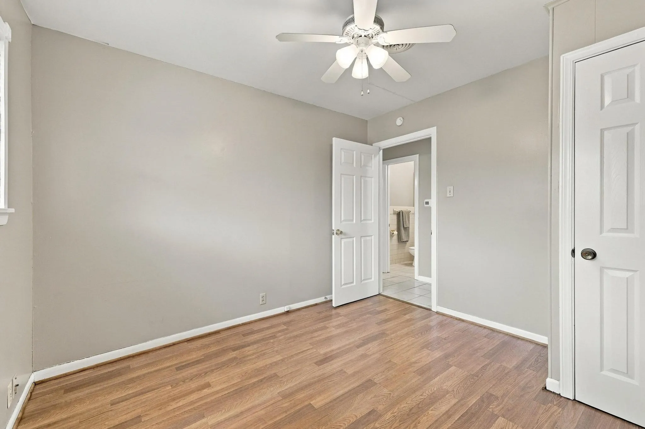 Large bedroom with natural lighting