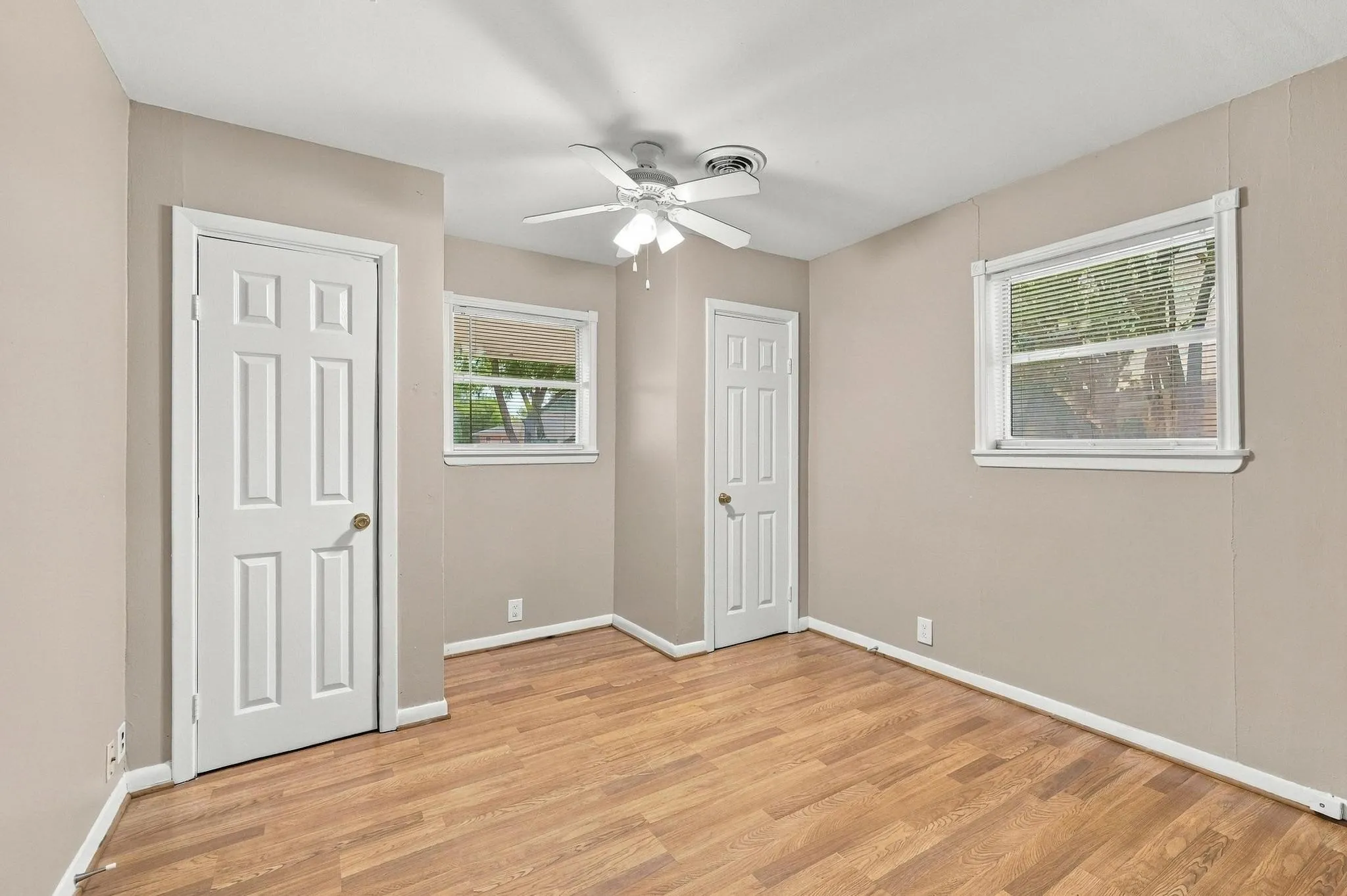 Large bedroom with natural lighting