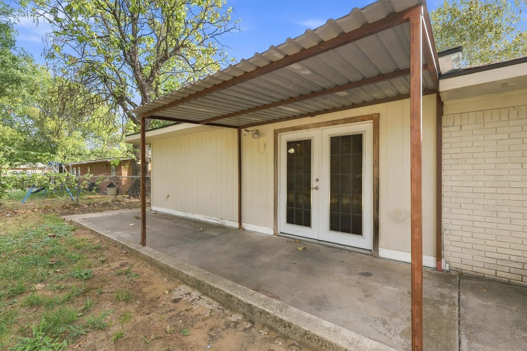 Back covered patio perfect for hosting BBQs