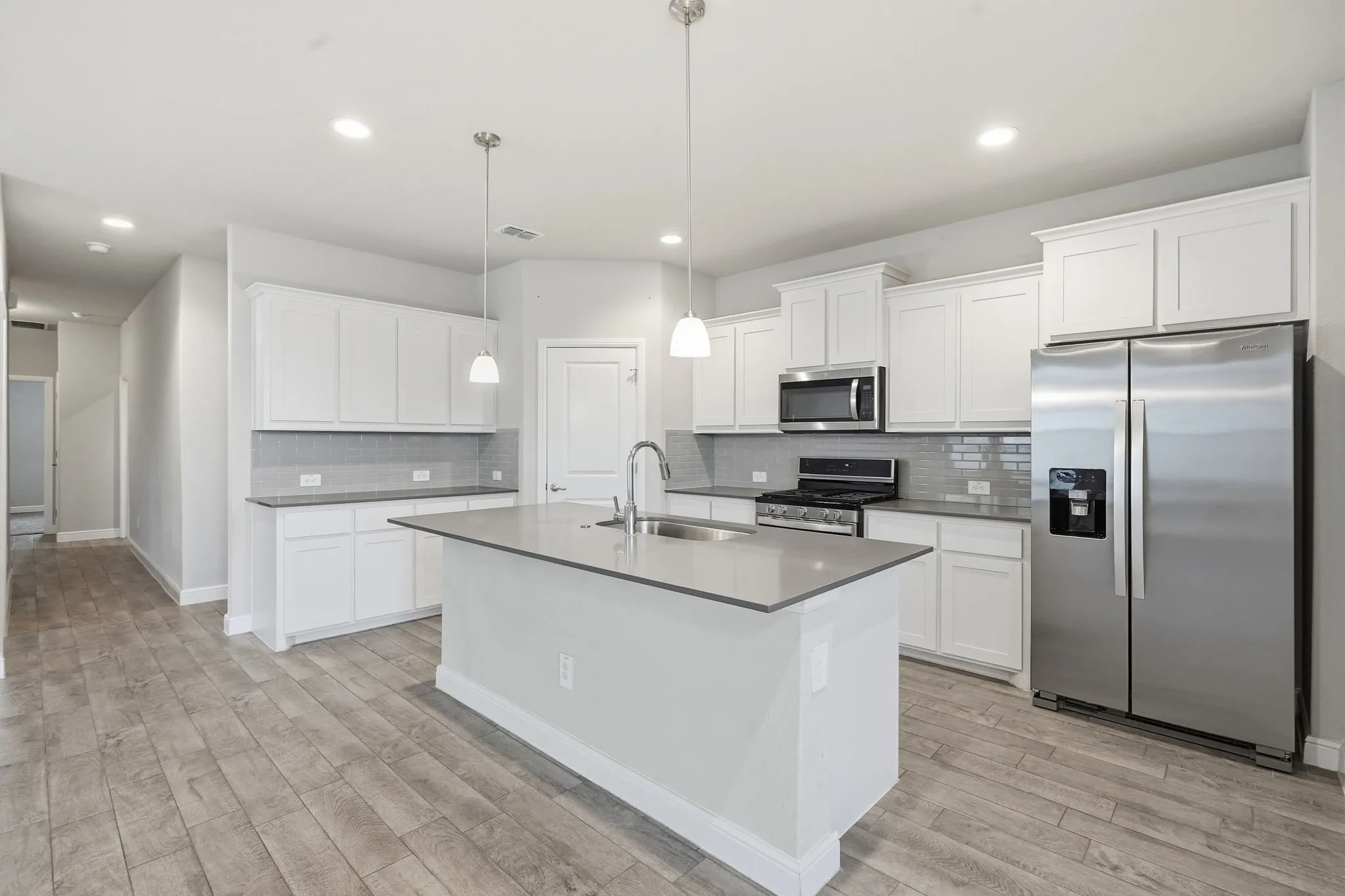 Tile Backsplash and Refrigerator Stays