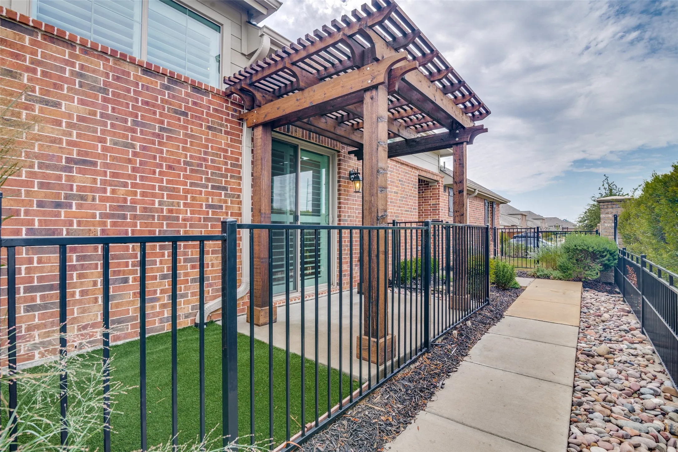 Gated patio and side yard