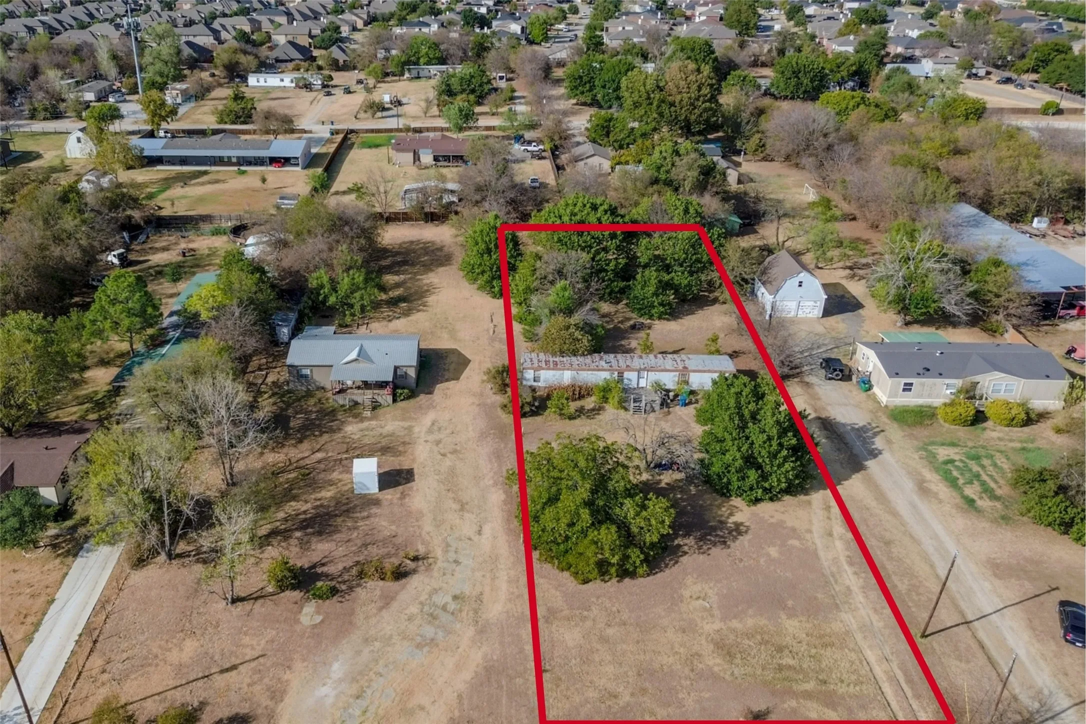 Aerial View - Facing Home from Lonesome Dove Drive - Boundaries are Approximate