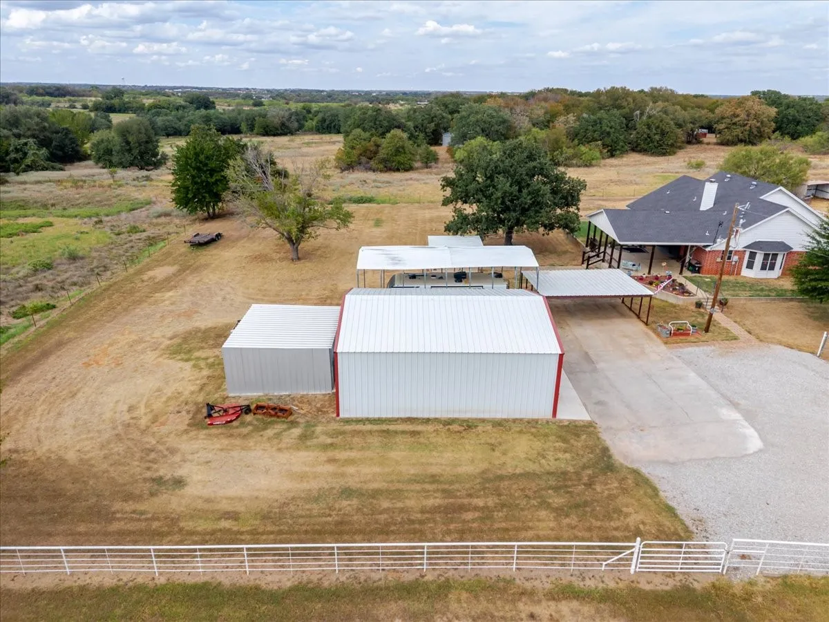 Double care carport and RV Carport along with plenty of parking area