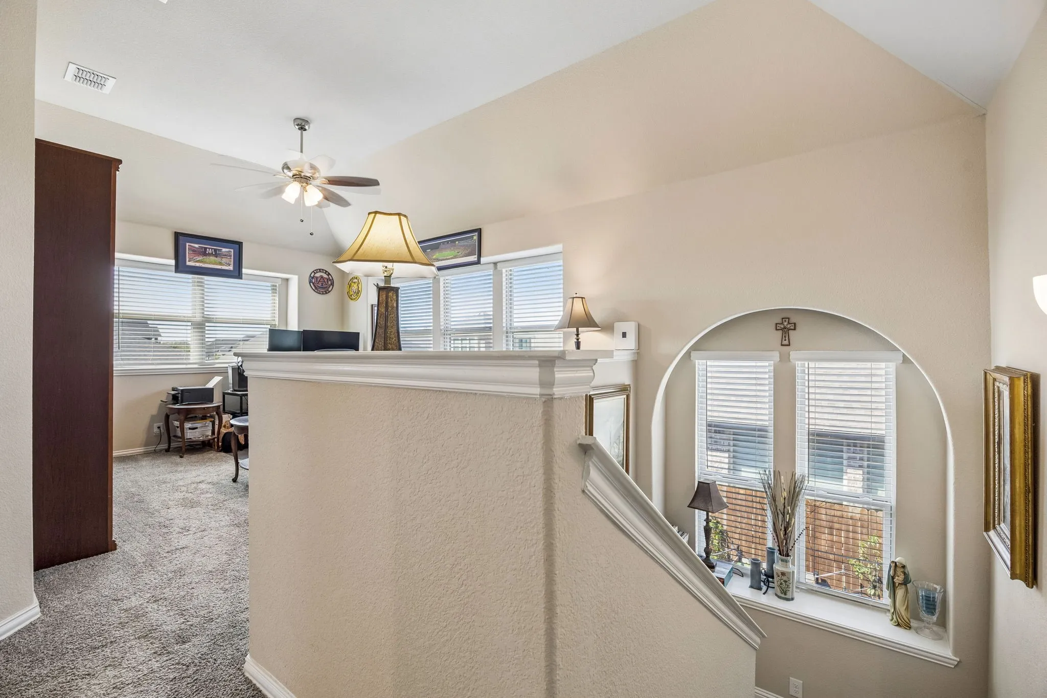 This home has a few arched details and window ledges, giving the home a little extra style.