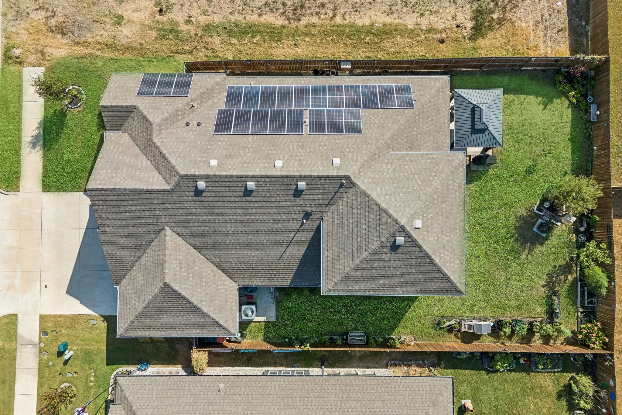 The home is situated on the lot to maximize the backyard.
