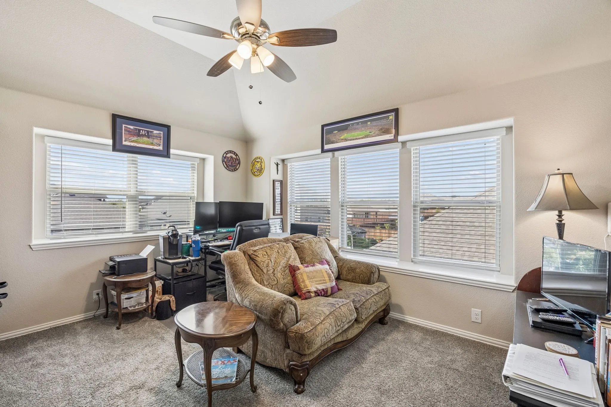 The upstairs could be it's own separate living quarters with this flex space, the bed and bathroom.  Perfect as an office, play room or hang out for teens.