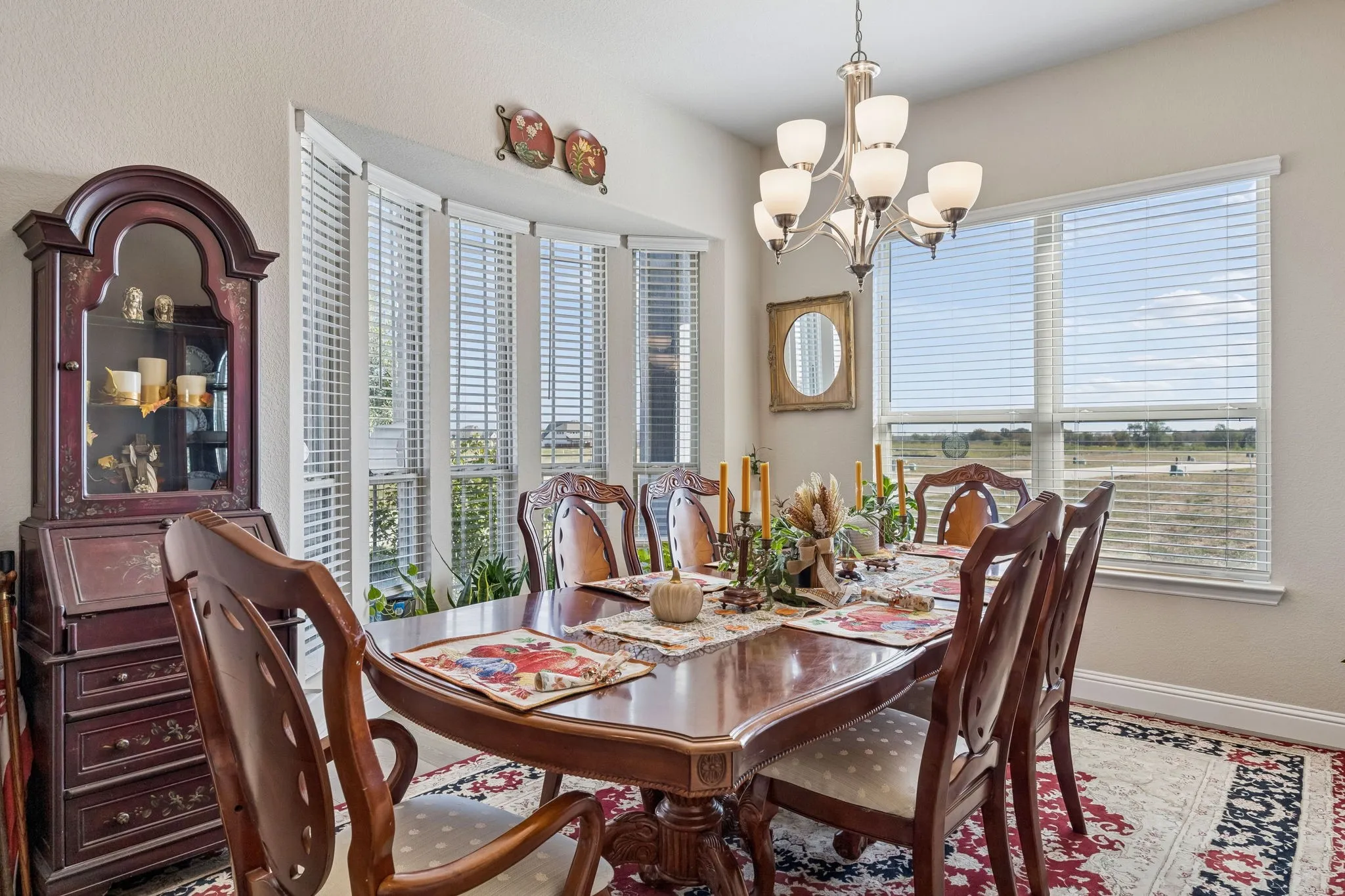 The formal dining room has a nice bay window feature and could easily be a home office.