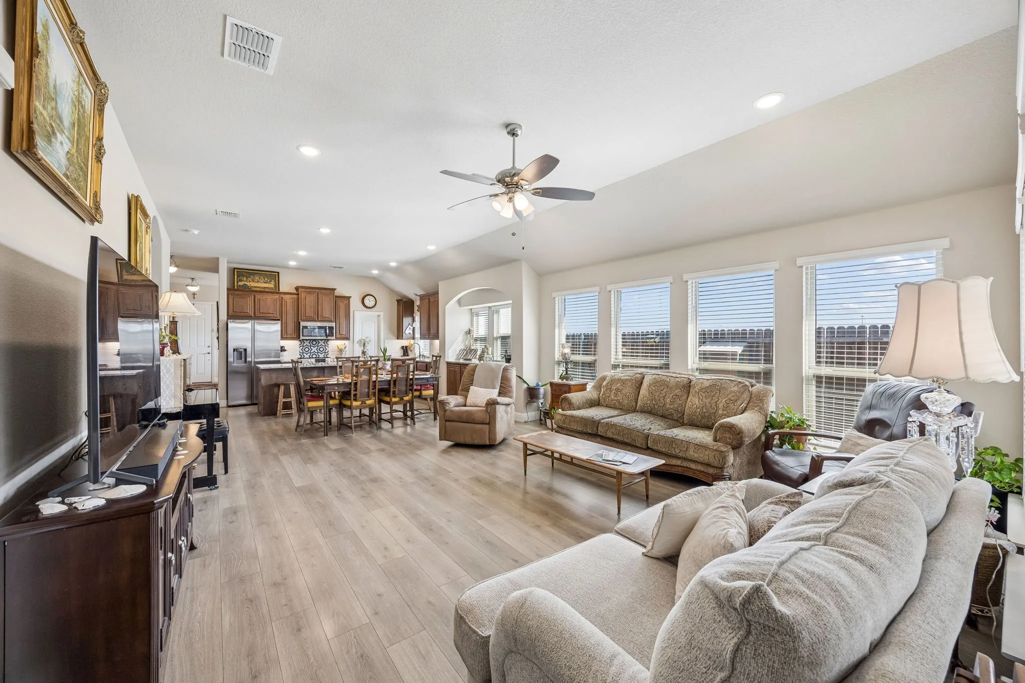 When they built the home, the current owner added extra can lighting and outlets so that any arrangement of furniture would work.