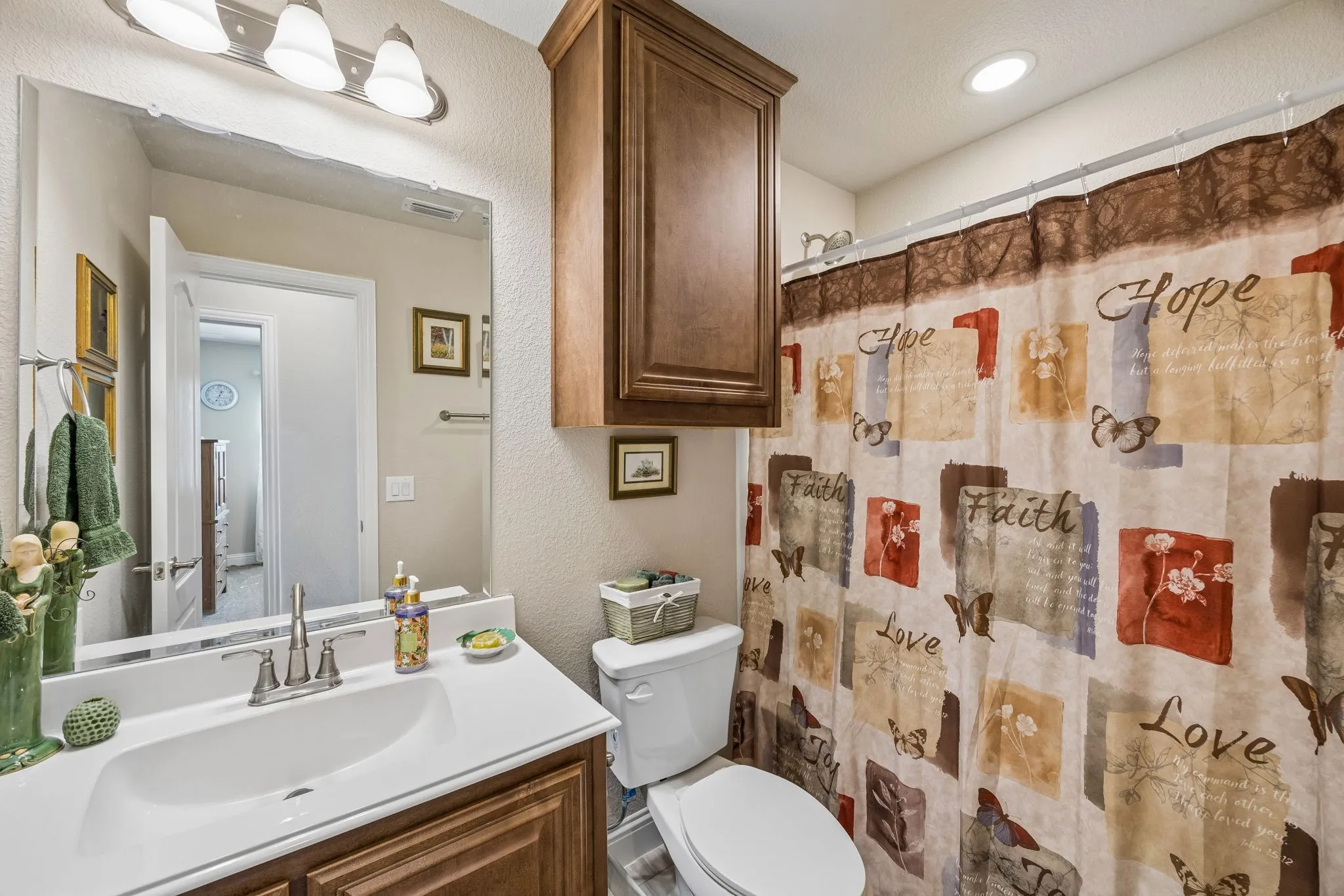 Each bathroom has nice storage and cabinetry.