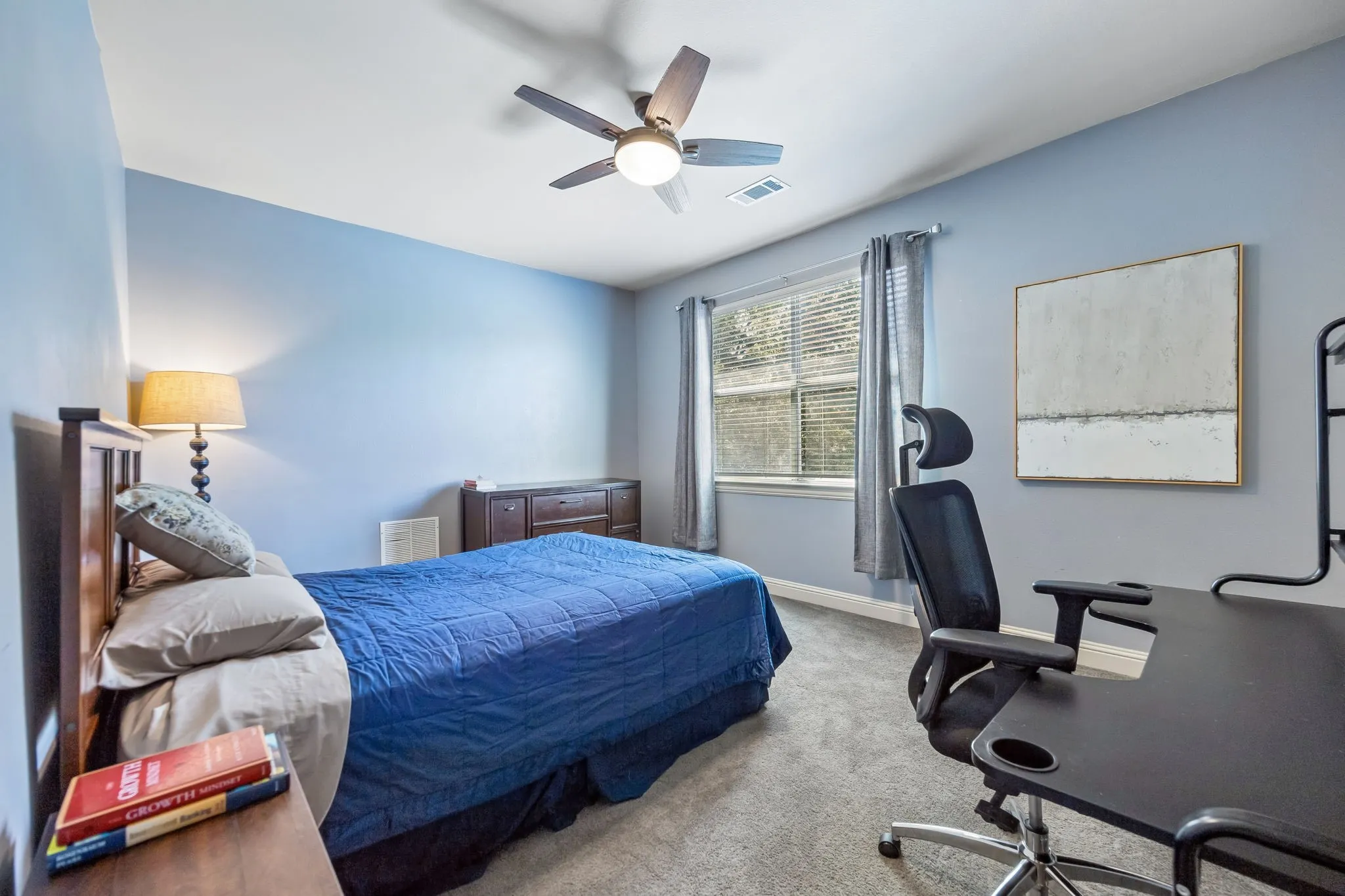 Secondary bedroom with walk in closet