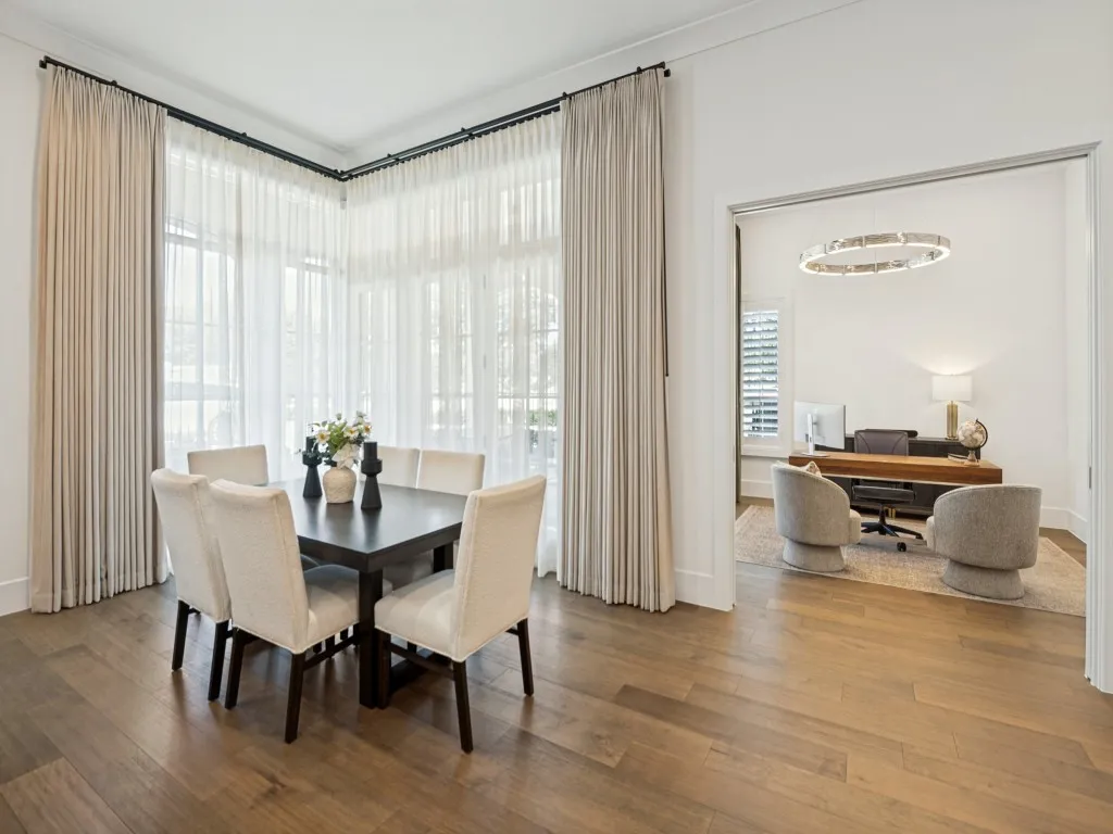 There is a door to access the large side patio on the right side of the drapery.  The drapery can easily be pulled to the side to access the patio as well, or closed for a more private dining setting.