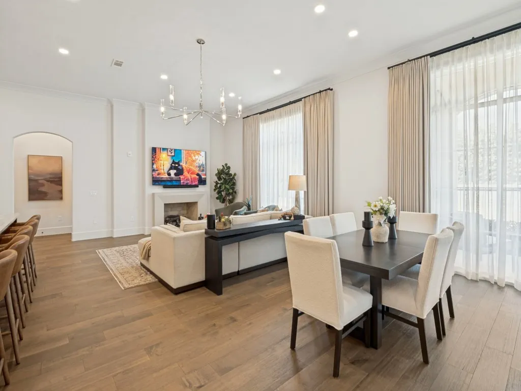 Another view of the entire room and wonderful chandelier in the living area.