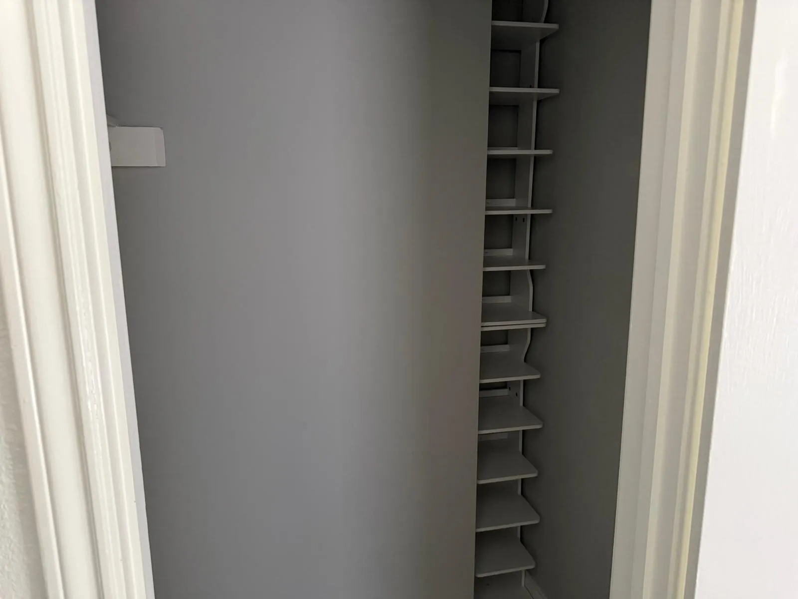 Built-in shelving with multiple storage tiers