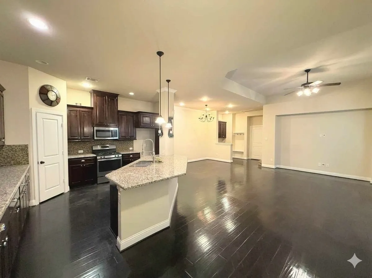 Open-concept living area featuring wood-finish flooring, recessed lighting, and a ceiling fan