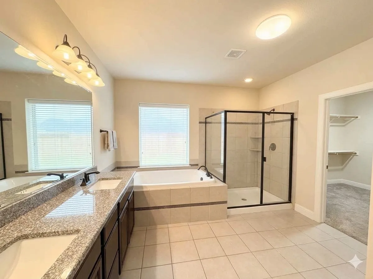 Dual vanity with undermount sinks and speckled countertops