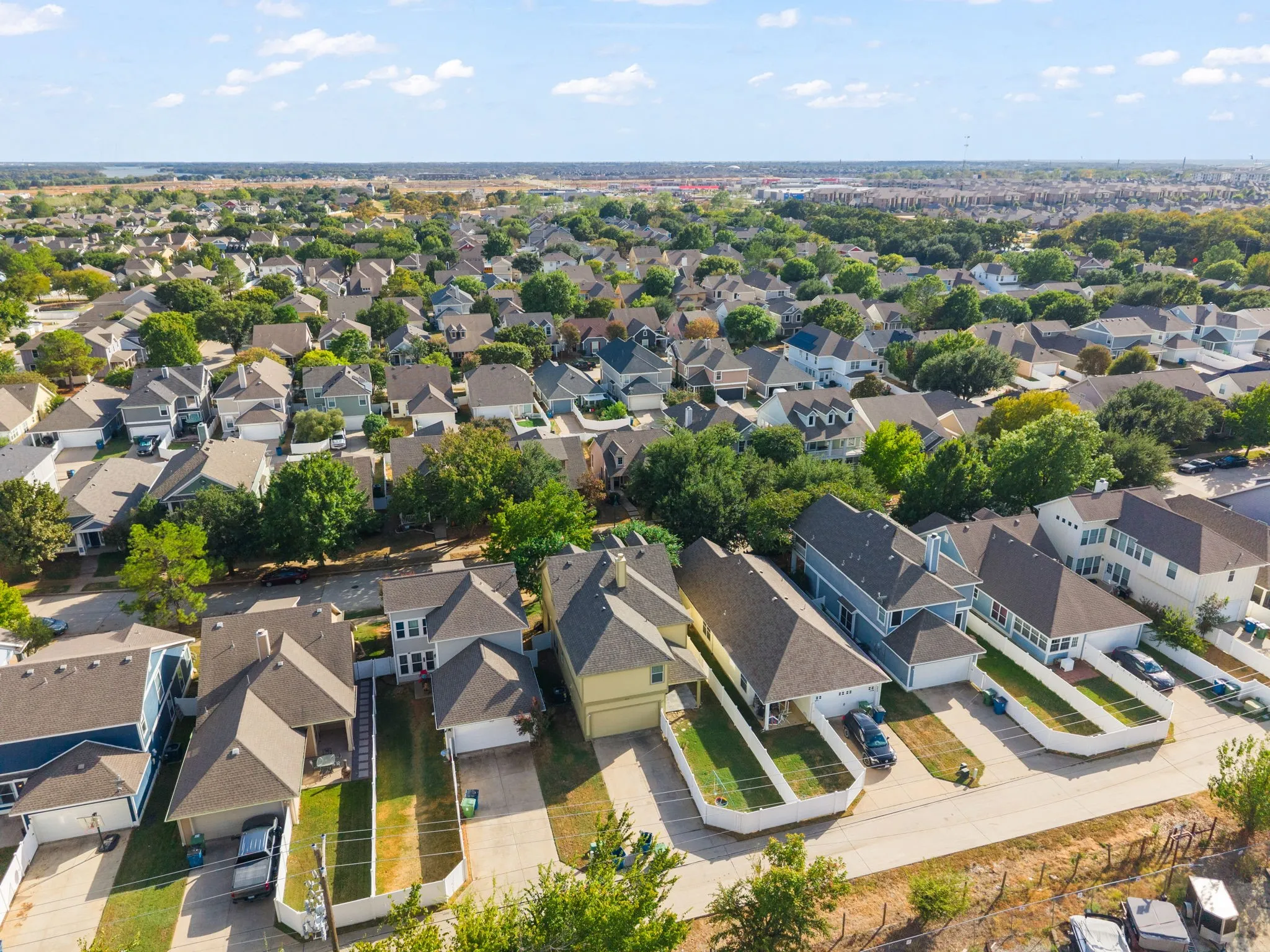 Residential neighborhood featuring detached homes with varied architectural styles and established landscaping