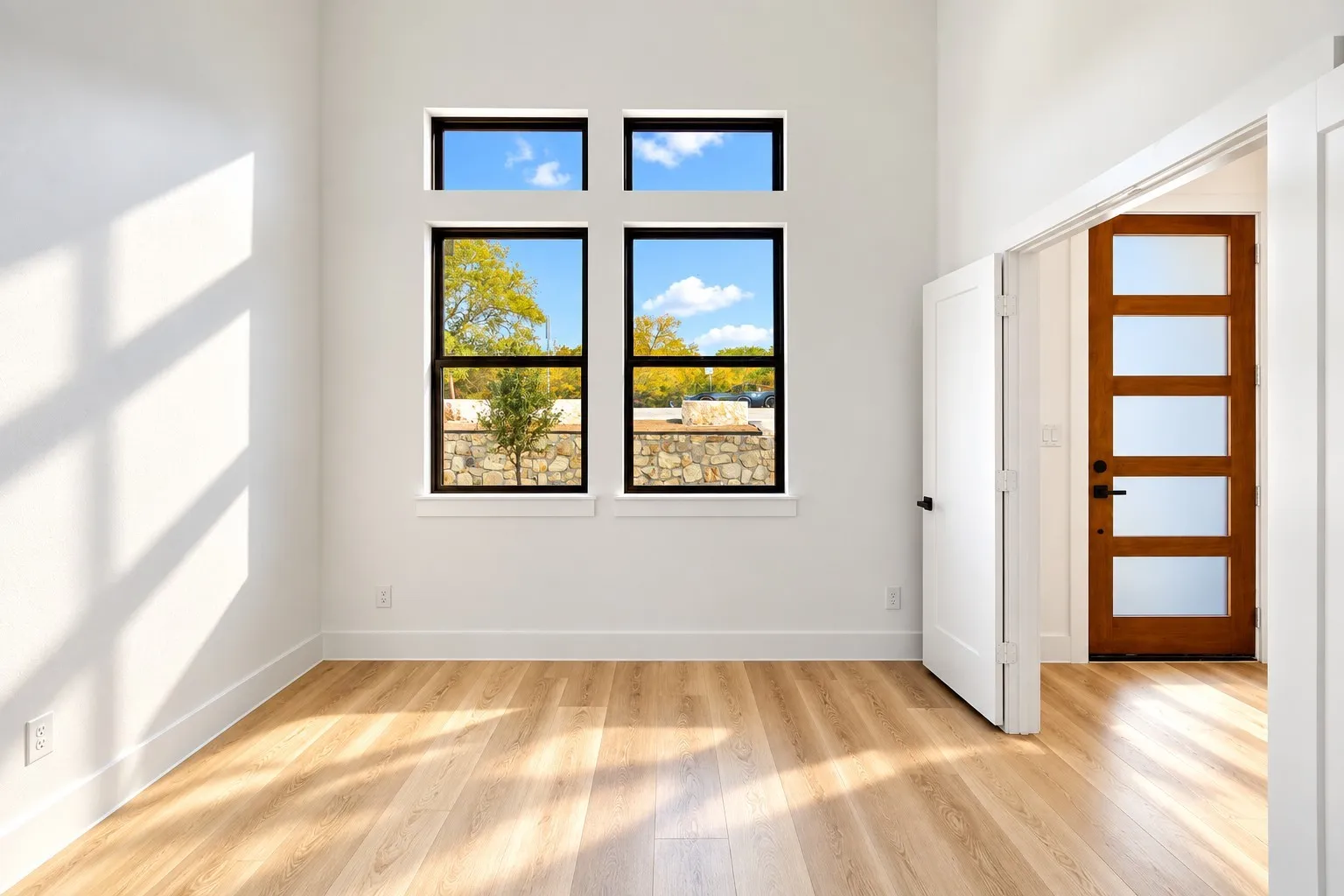 Wood-finish flooring with white walls