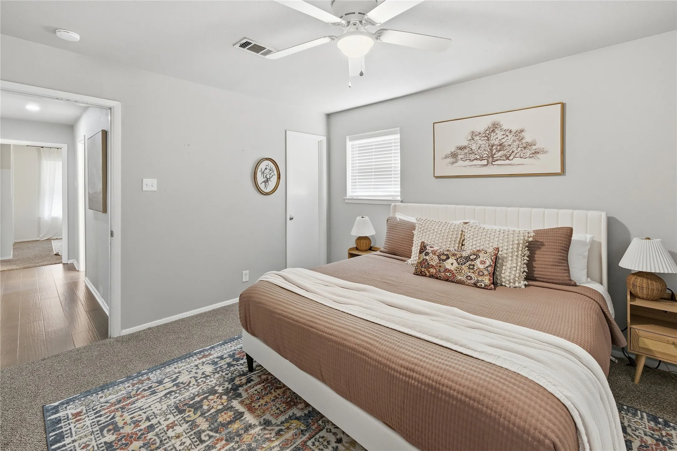 Recessed lighting, ceiling fan, window with blinds, light gray wall paint, and plush carpeting