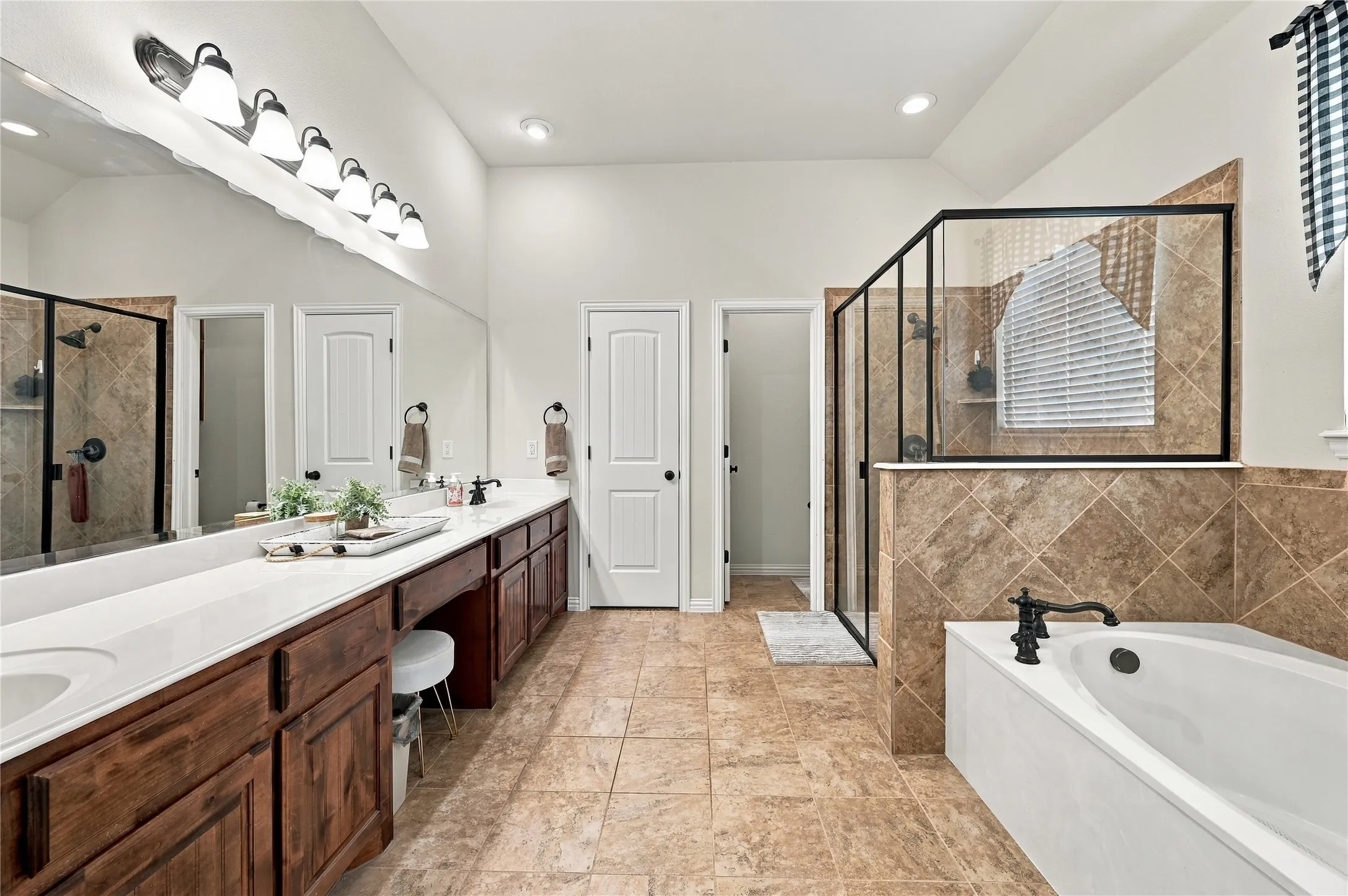 Primary bathroom with oveside vanity