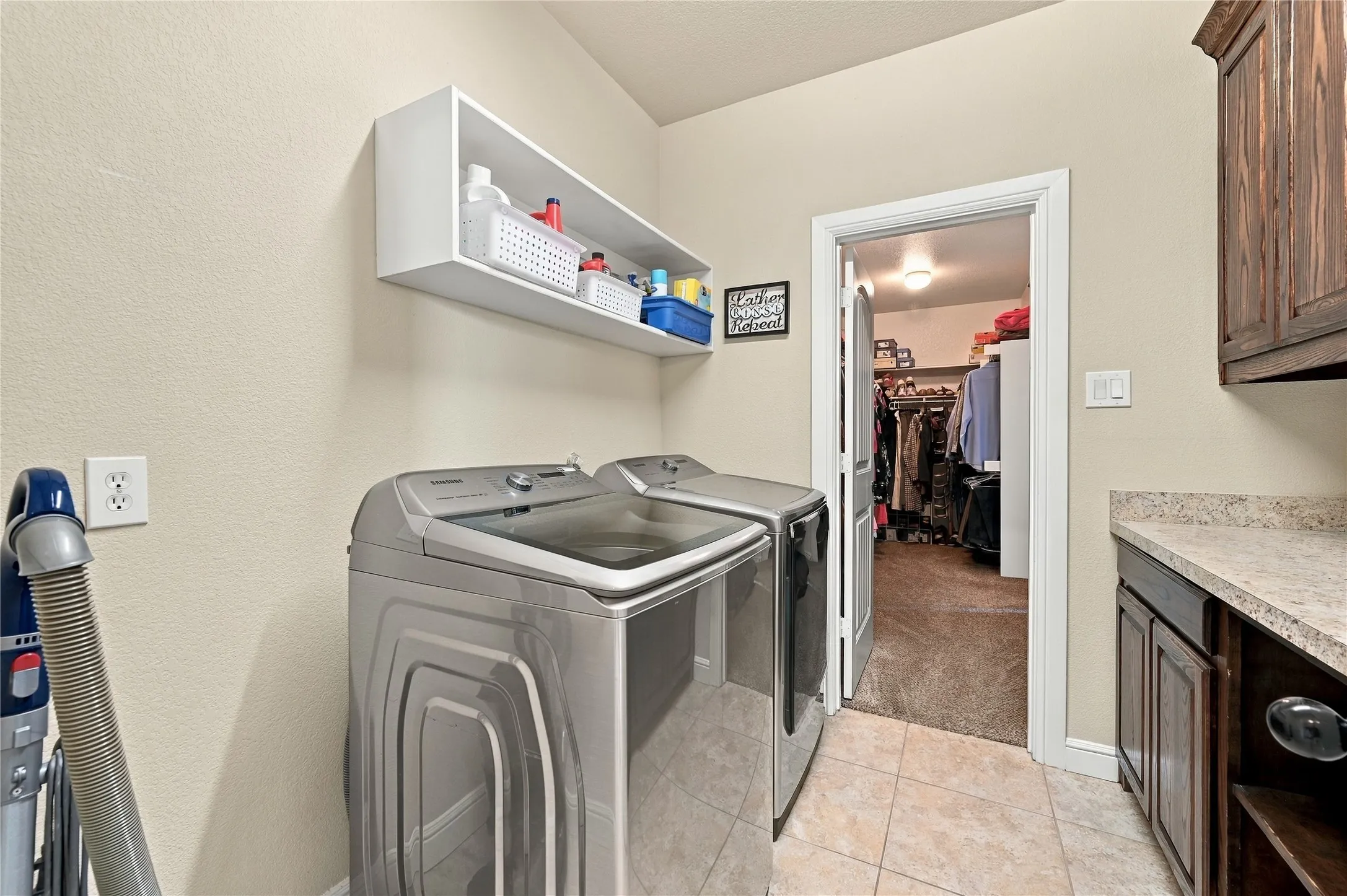 Laundry room that connects to primary closet